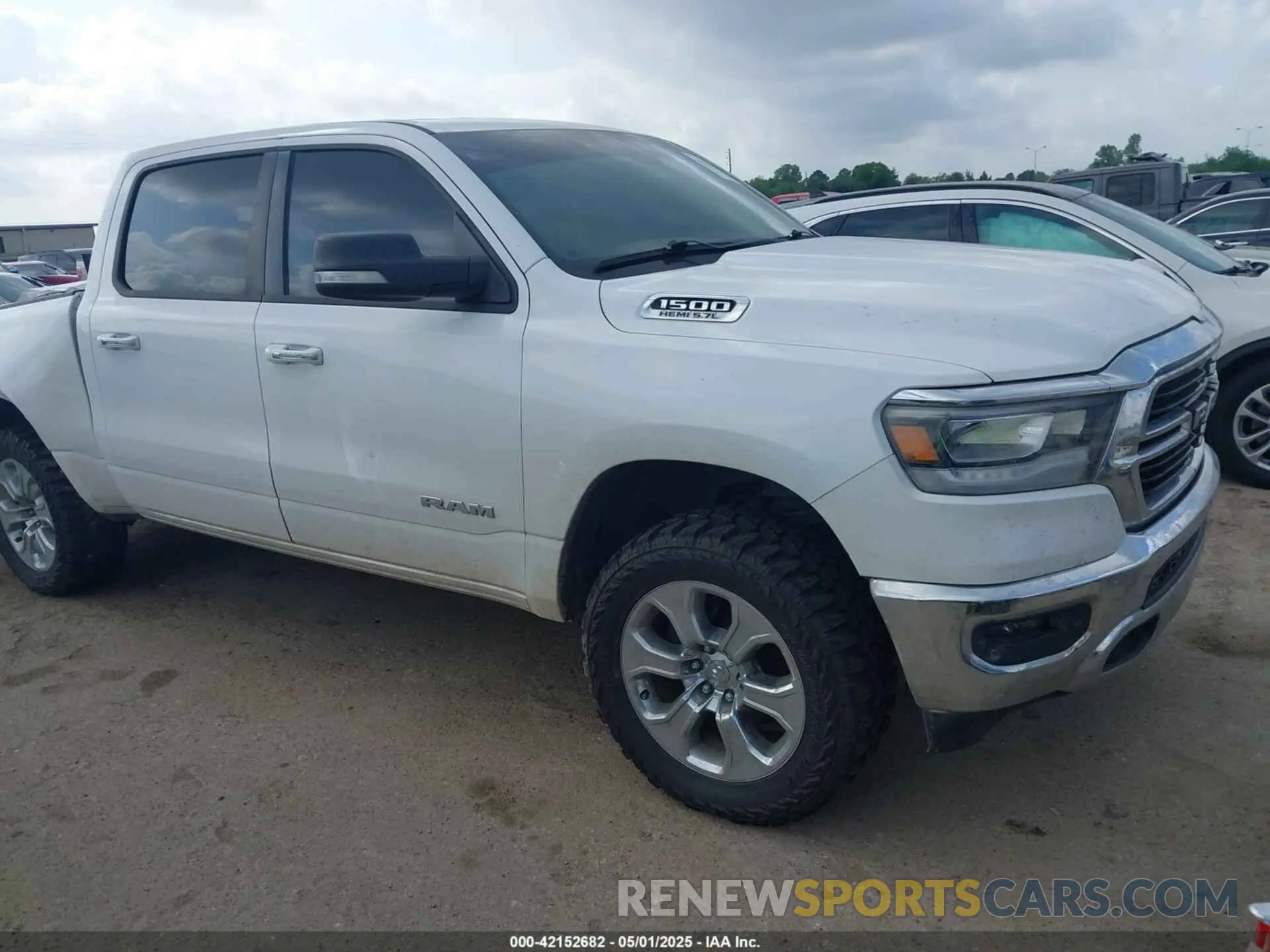 1 Photograph of a damaged car 1C6SRFFT9KN570711 RAM 1500 2019