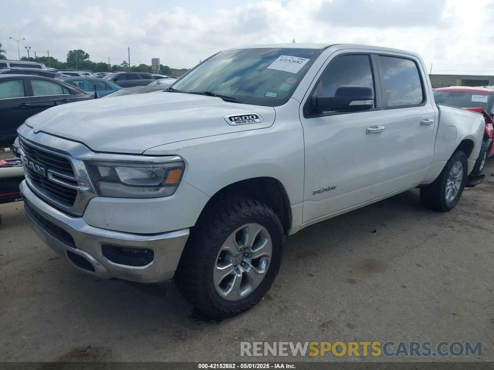 2 Photograph of a damaged car 1C6SRFFT9KN570711 RAM 1500 2019