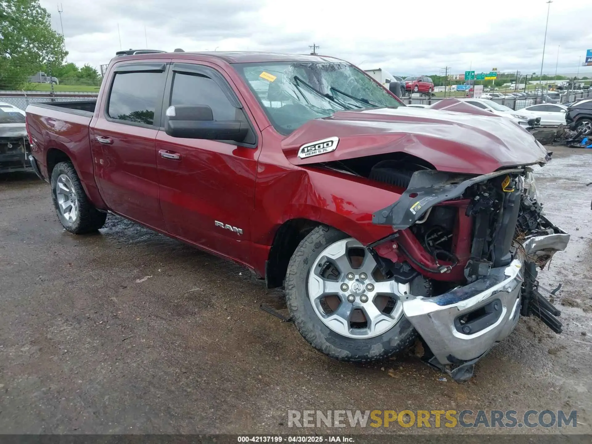 1 Photograph of a damaged car 1C6SRFFT9KN574273 RAM 1500 2019