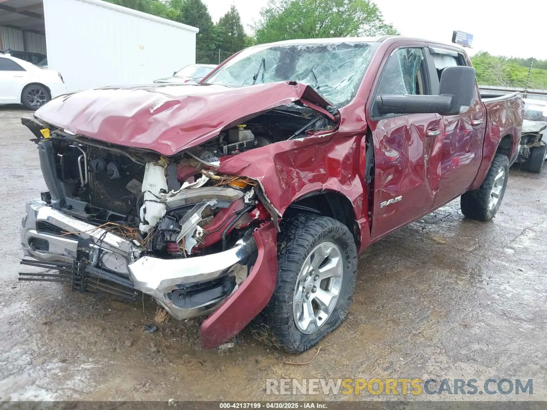 2 Photograph of a damaged car 1C6SRFFT9KN574273 RAM 1500 2019