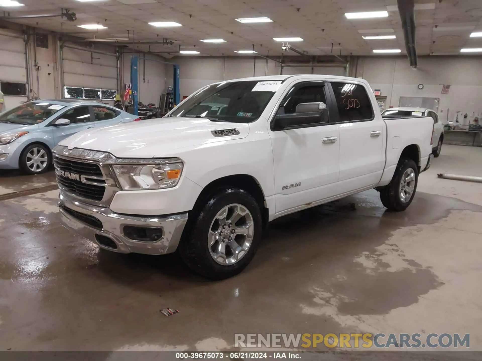 2 Photograph of a damaged car 1C6SRFFT9KN575214 RAM 1500 2019