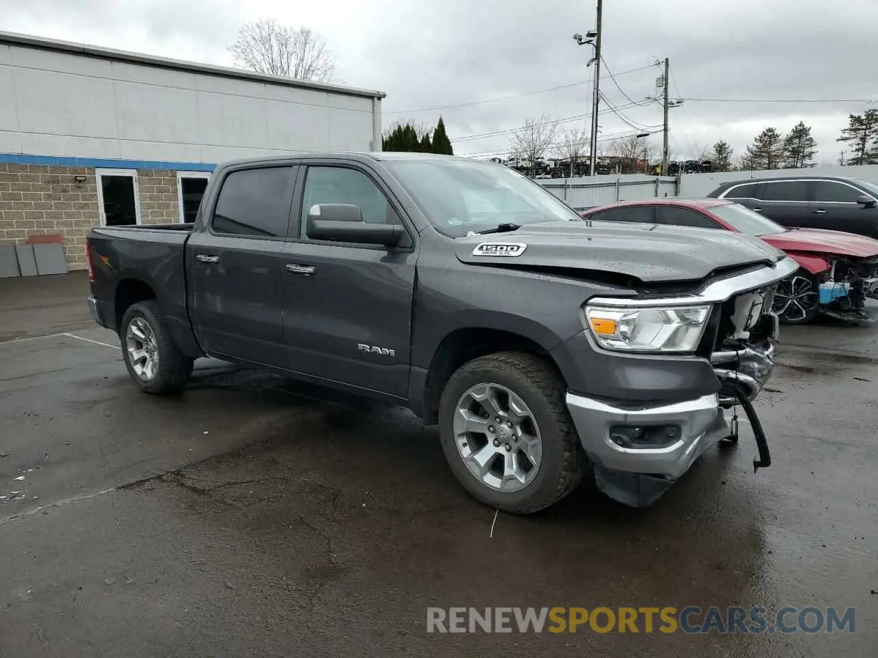 4 Photograph of a damaged car 1C6SRFFT9KN644239 RAM 1500 2019