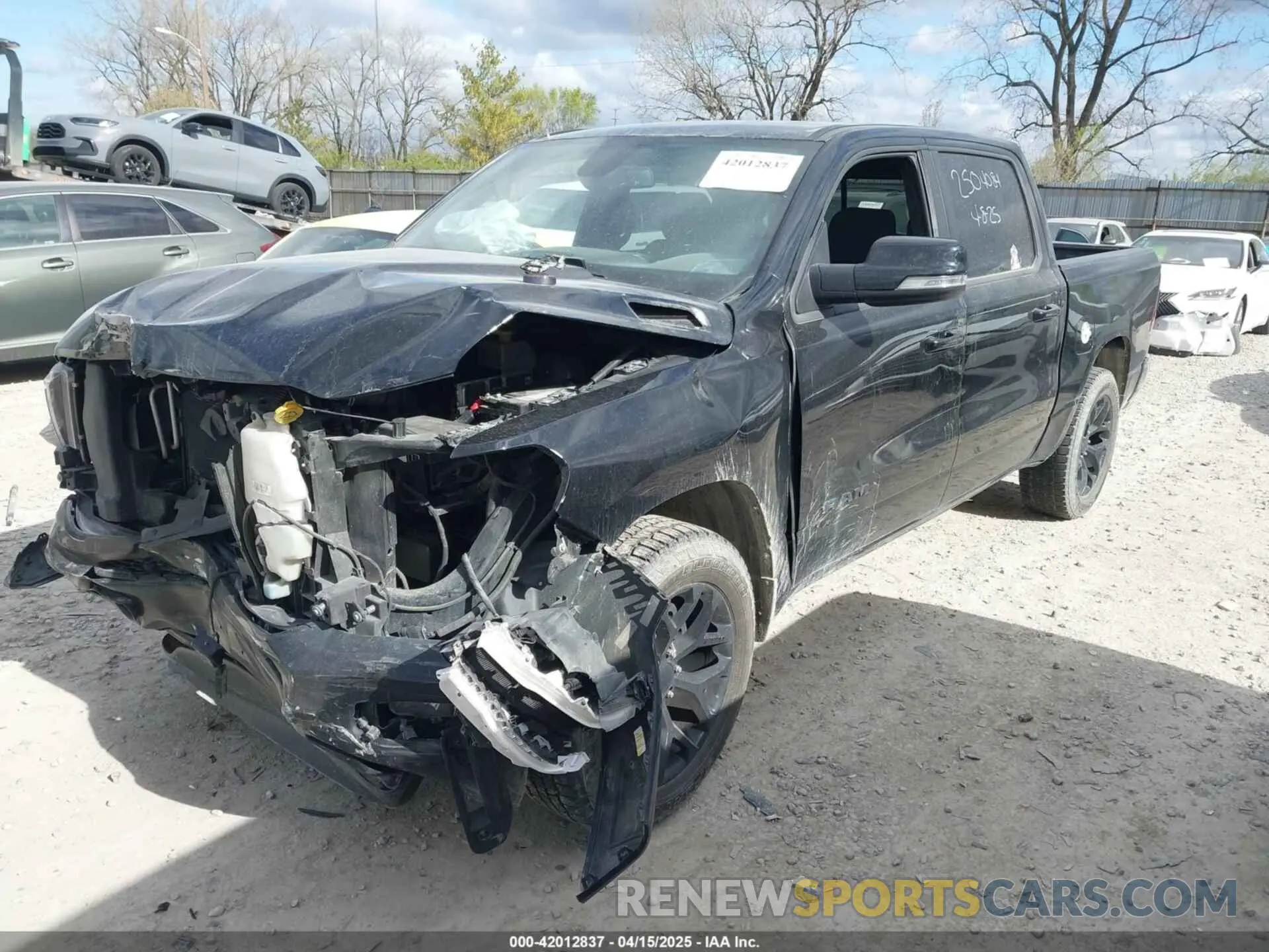 2 Photograph of a damaged car 1C6SRFFTXKN524482 RAM 1500 2019