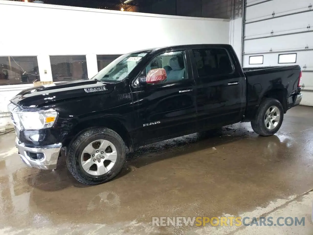 1 Photograph of a damaged car 1C6SRFFTXKN695717 RAM 1500 2019