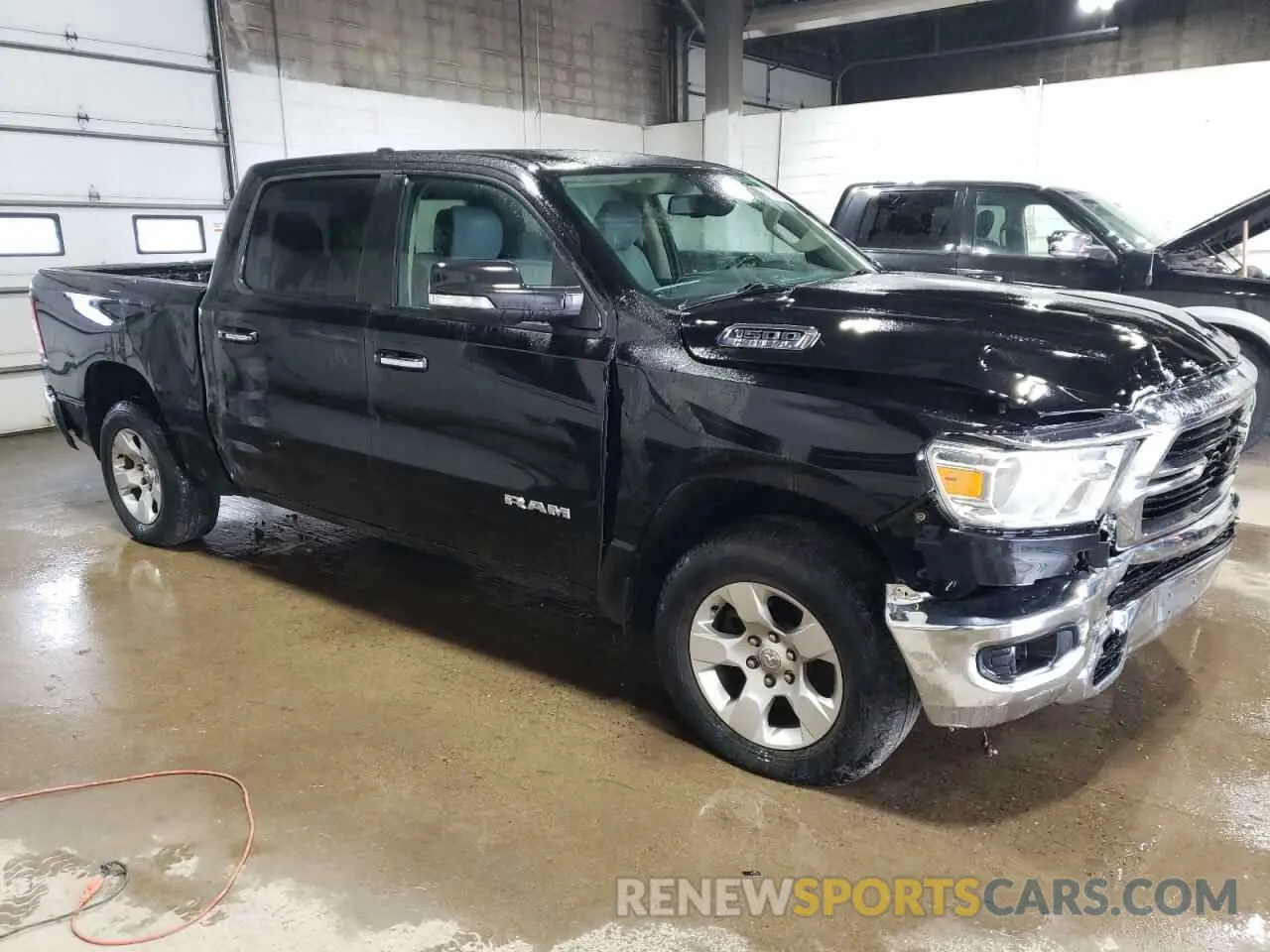 4 Photograph of a damaged car 1C6SRFFTXKN695717 RAM 1500 2019