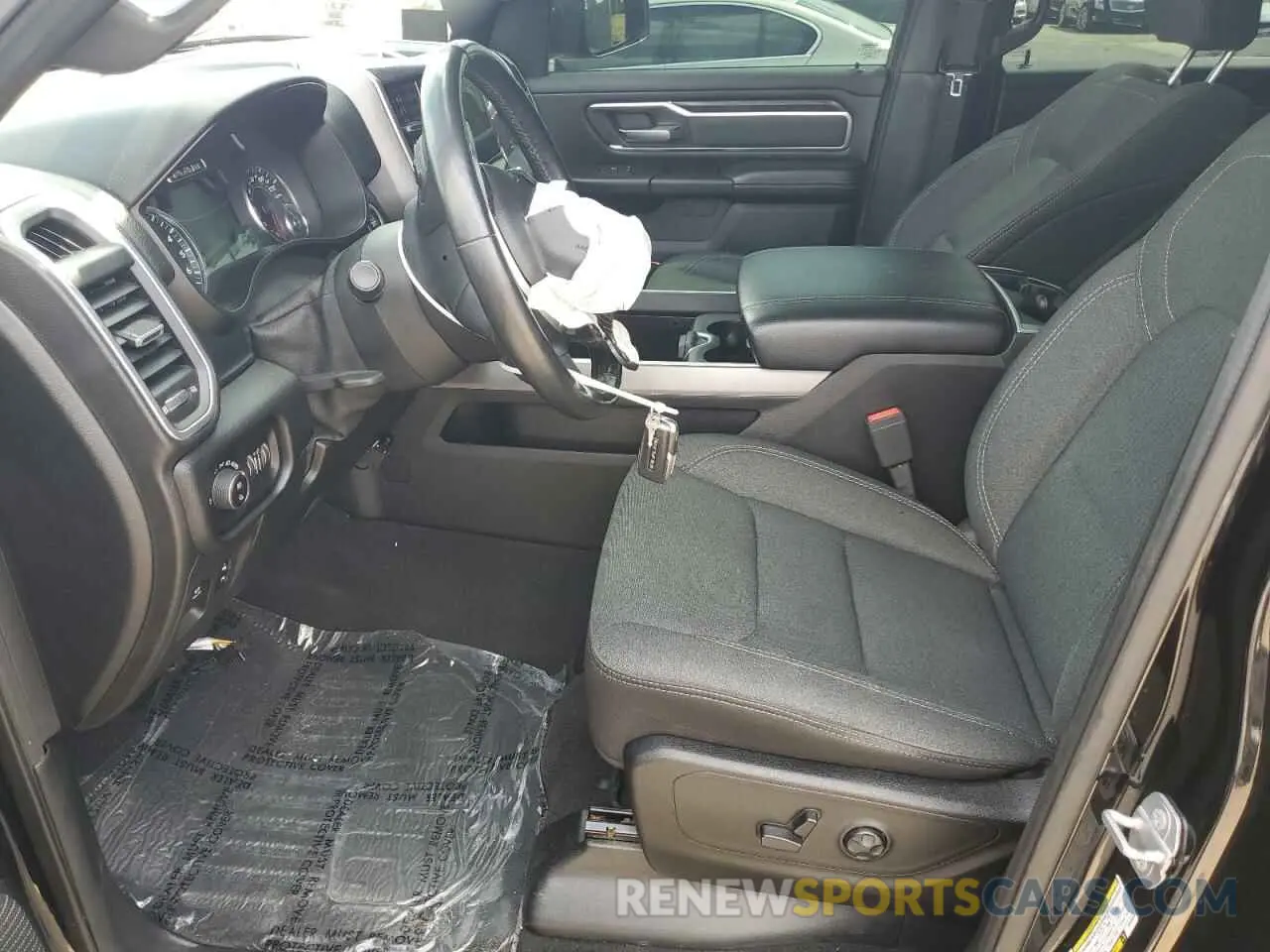 7 Photograph of a damaged car 1C6SRFFTXKN709454 RAM 1500 2019