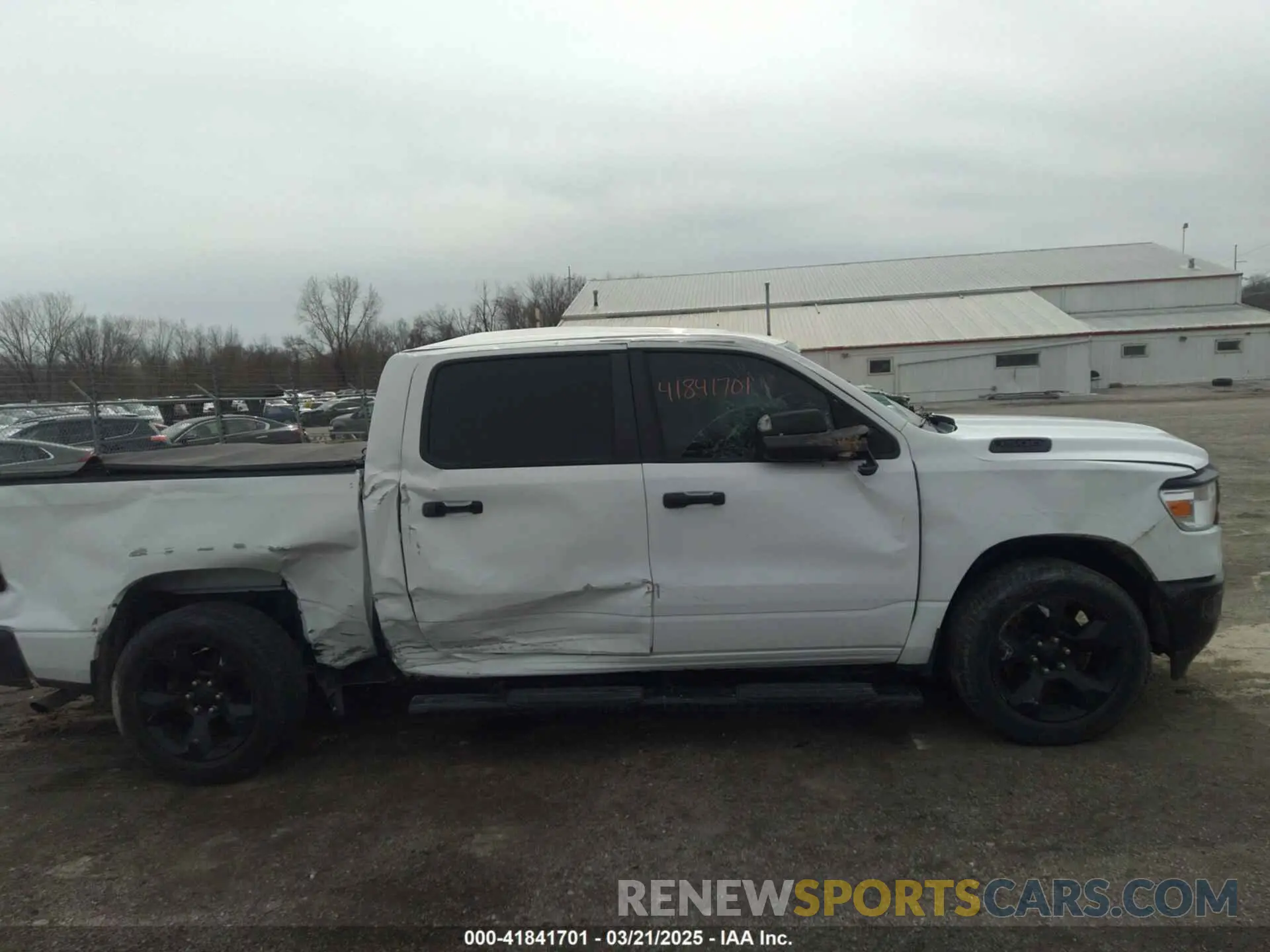 13 Photograph of a damaged car 1C6SRFGT3KN580746 RAM 1500 2019
