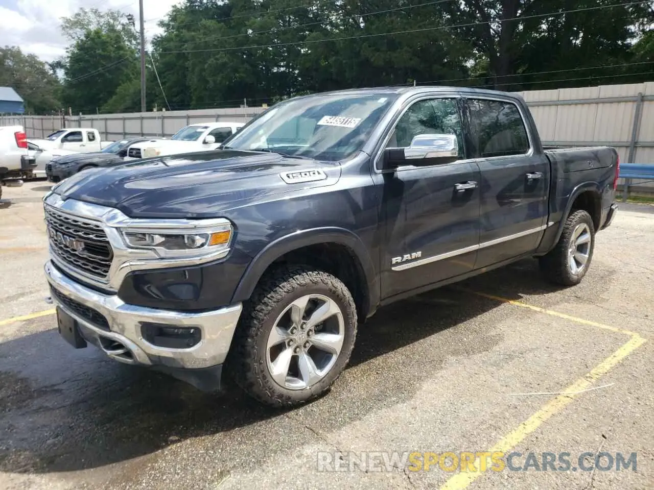 1 Photograph of a damaged car 1C6SRFHT0KN600739 RAM 1500 2019