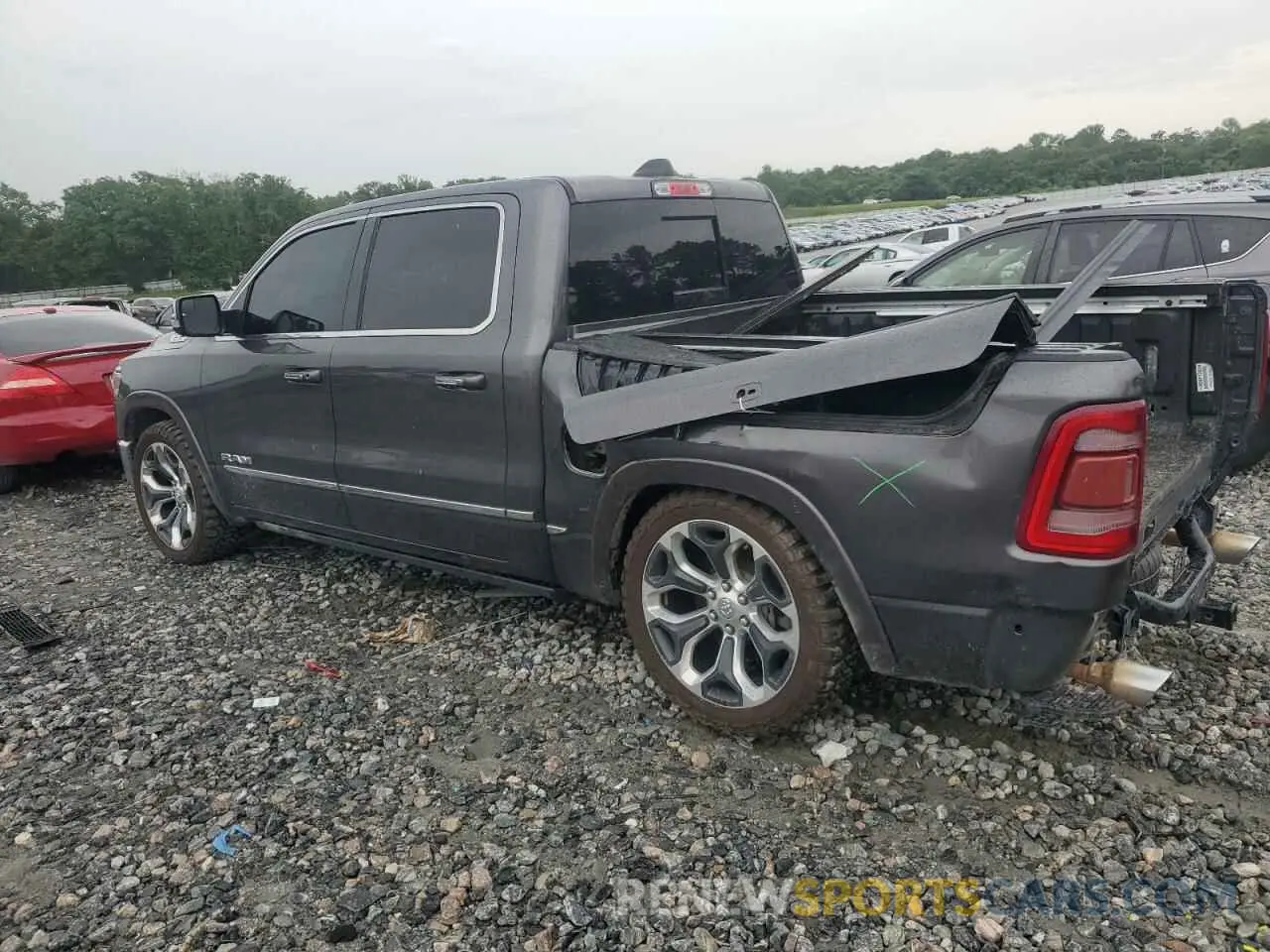 2 Photograph of a damaged car 1C6SRFHT4KN812608 RAM 1500 2019