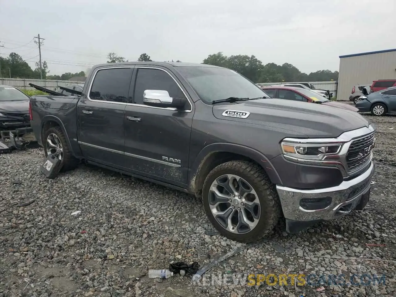 4 Photograph of a damaged car 1C6SRFHT4KN812608 RAM 1500 2019