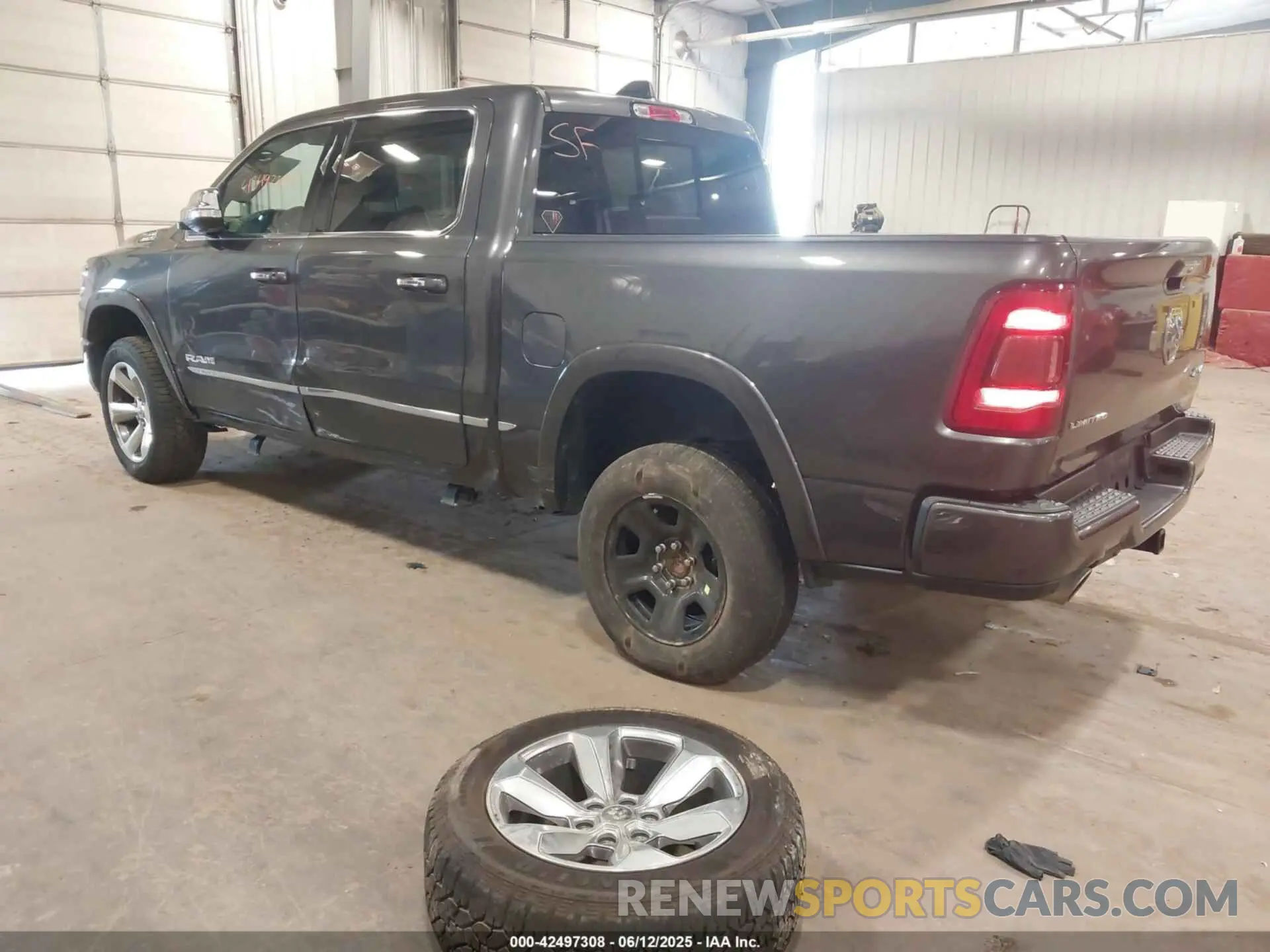 3 Photograph of a damaged car 1C6SRFHT6KN732727 RAM 1500 2019