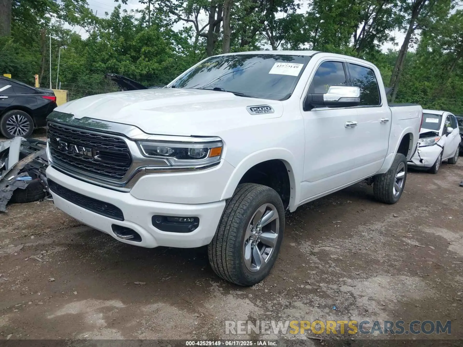 2 Photograph of a damaged car 1C6SRFHT8KN695891 RAM 1500 2019