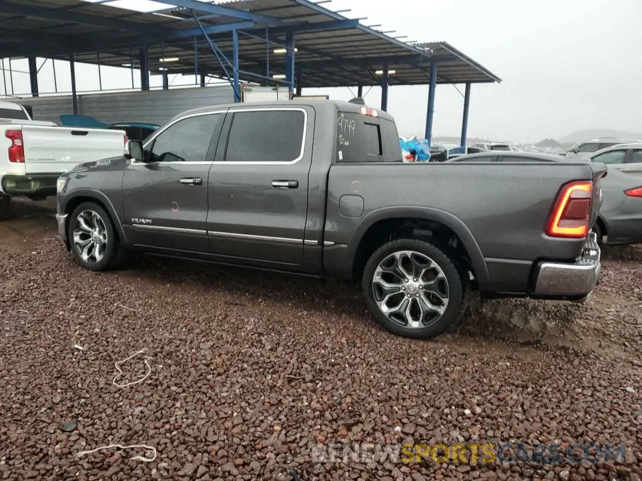 2 Photograph of a damaged car 1C6SRFHTXKN512958 RAM 1500 2019