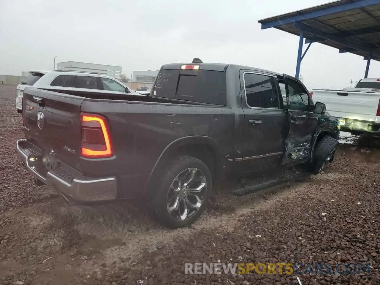 3 Photograph of a damaged car 1C6SRFHTXKN512958 RAM 1500 2019