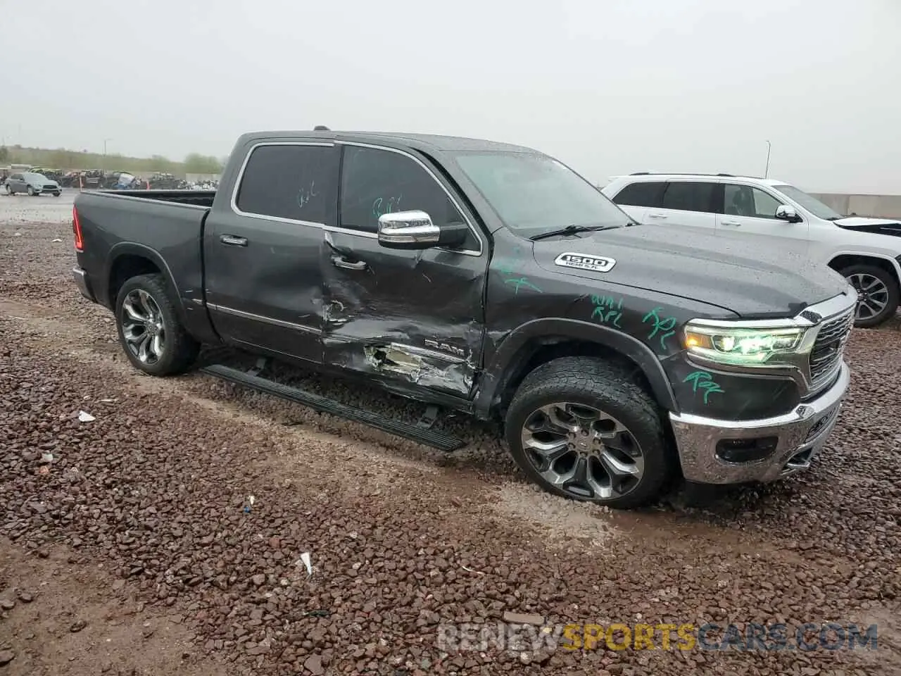 4 Photograph of a damaged car 1C6SRFHTXKN512958 RAM 1500 2019