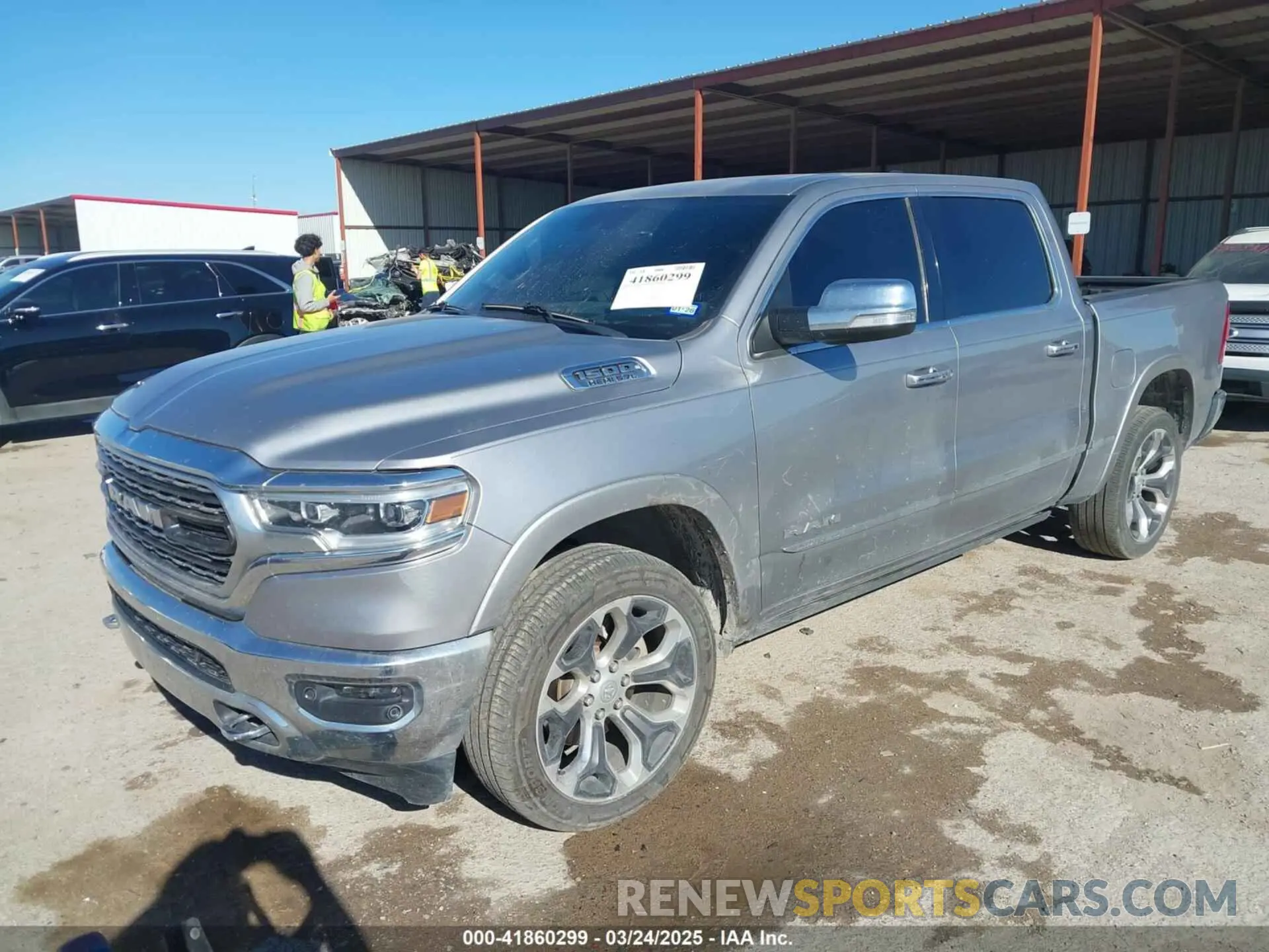 2 Photograph of a damaged car 1C6SRFHTXKN774690 RAM 1500 2019