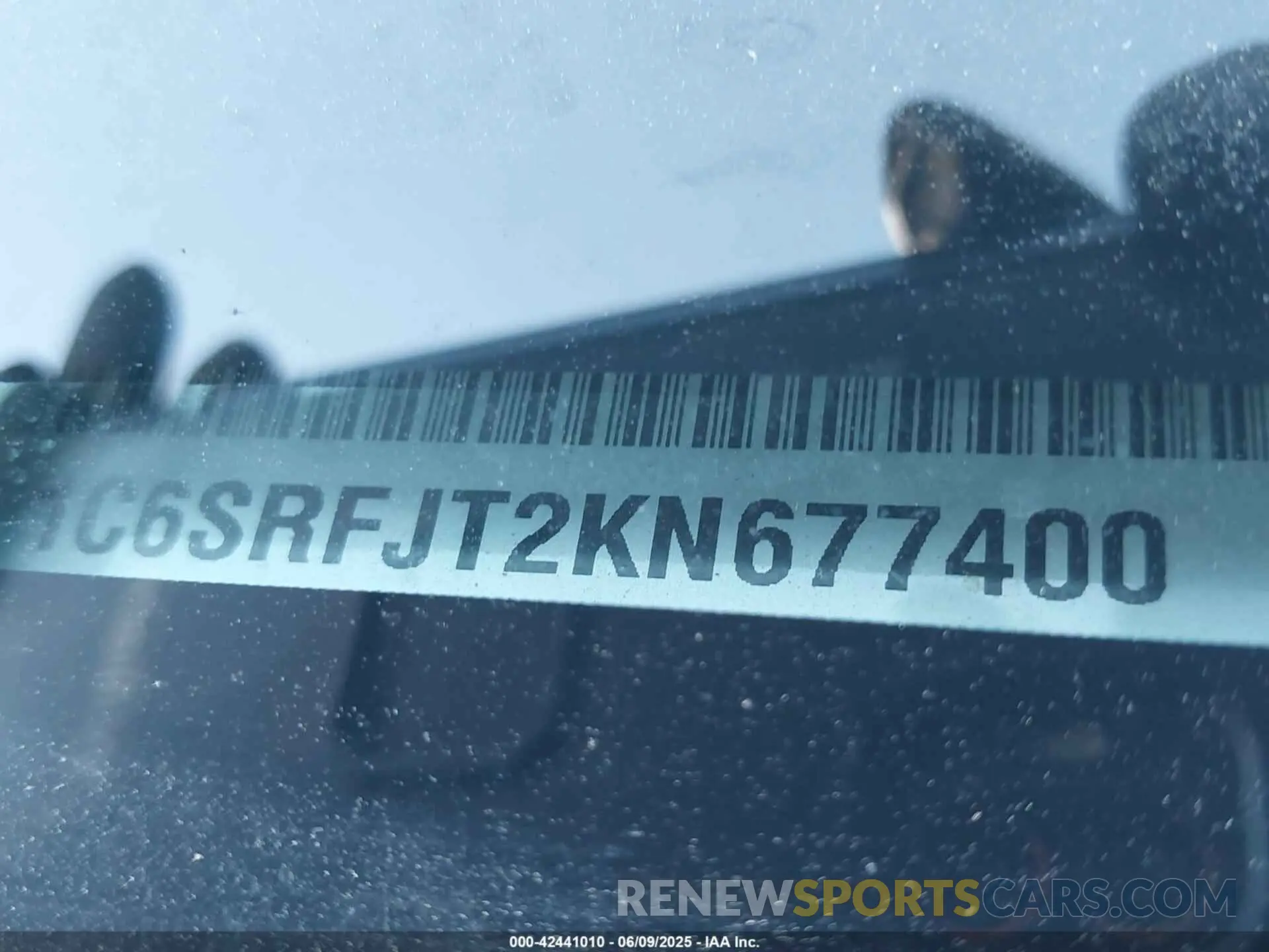 21 Photograph of a damaged car 1C6SRFJT2KN677400 RAM 1500 2019