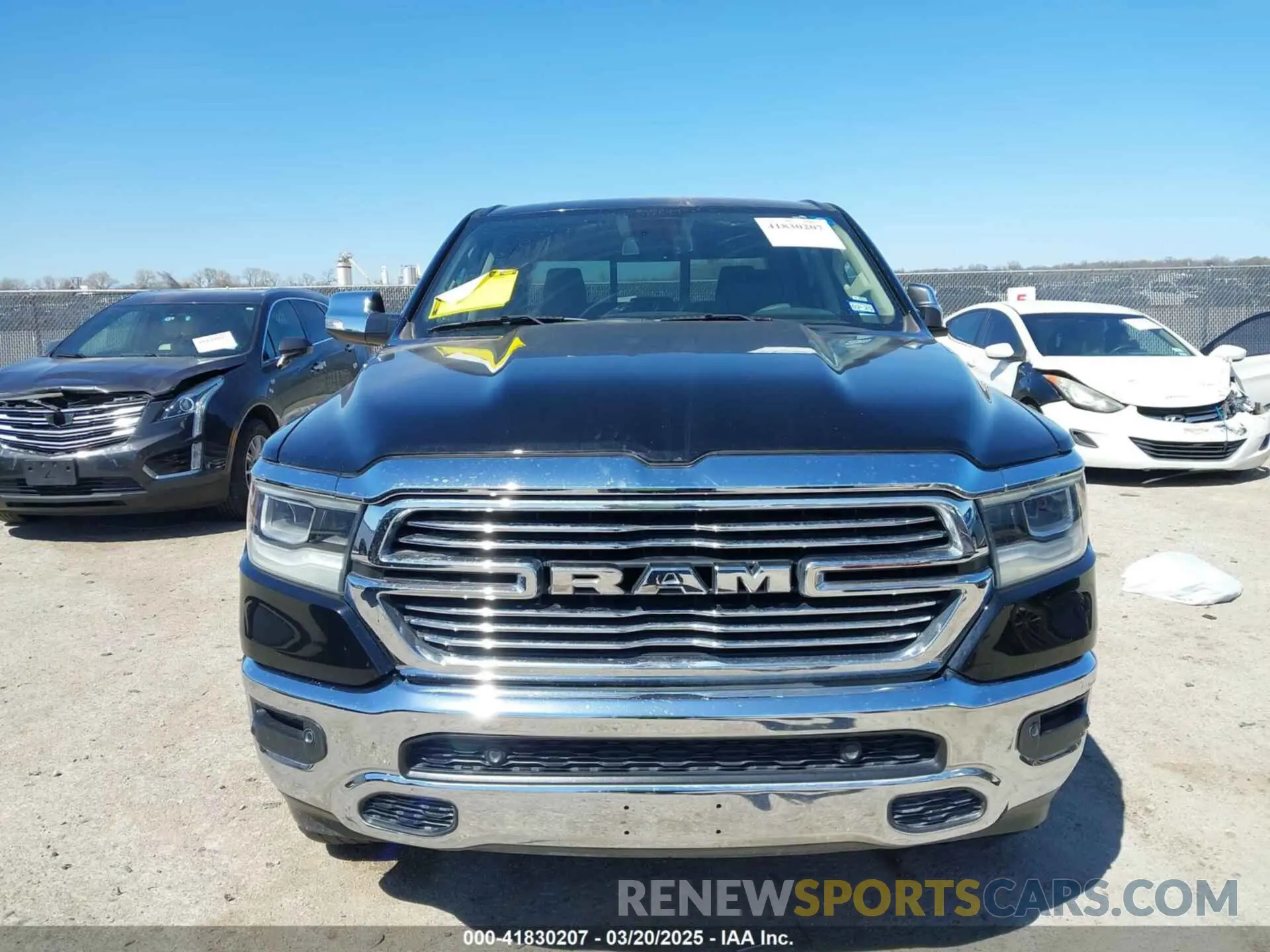 12 Photograph of a damaged car 1C6SRFJT3KN623670 RAM 1500 2019