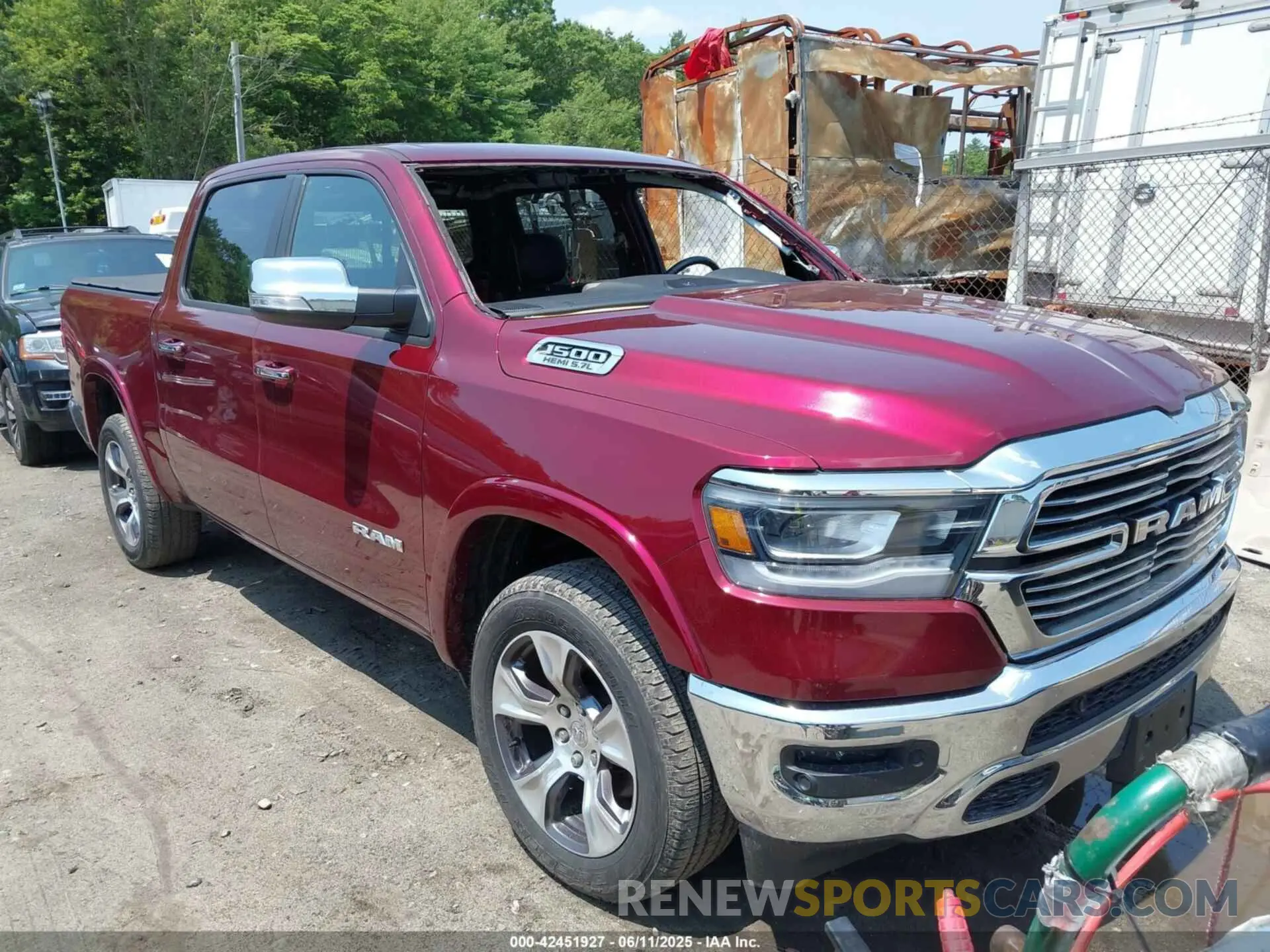 1 Photograph of a damaged car 1C6SRFJT5KN849869 RAM 1500 2019