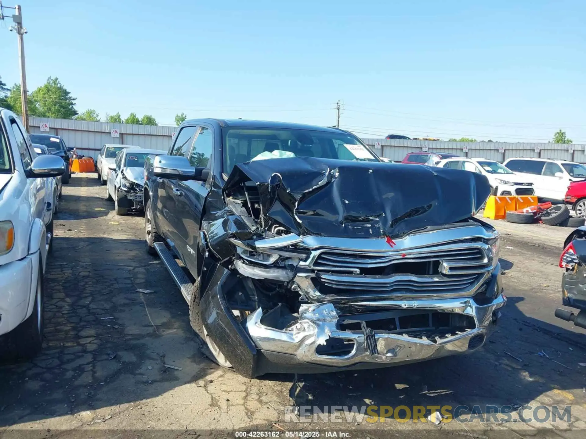 1 Photograph of a damaged car 1C6SRFJT9KN732201 RAM 1500 2019