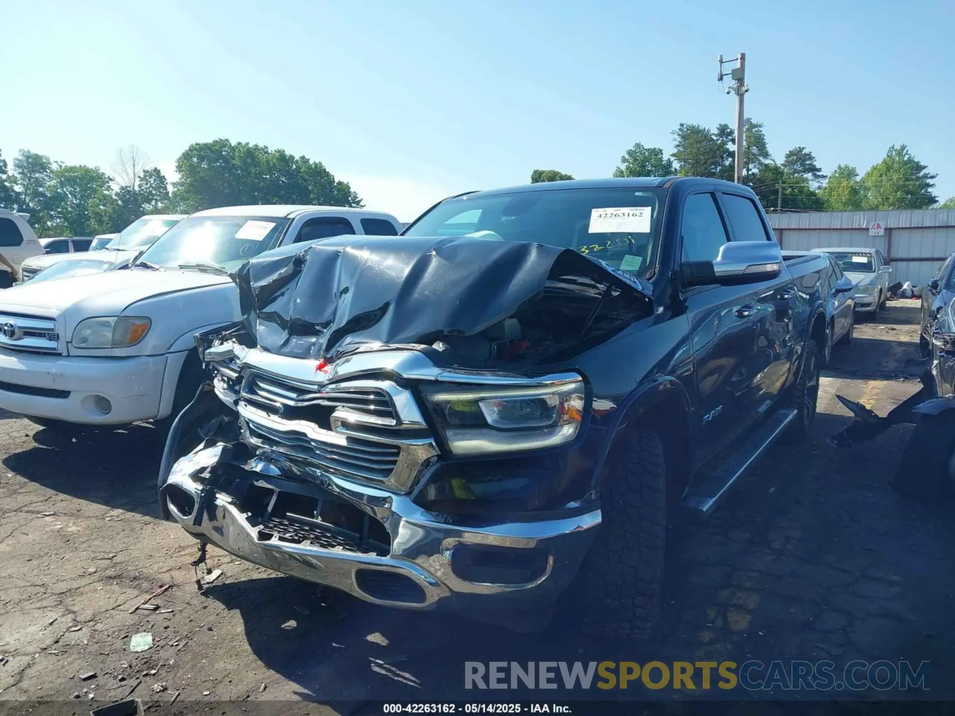 2 Photograph of a damaged car 1C6SRFJT9KN732201 RAM 1500 2019