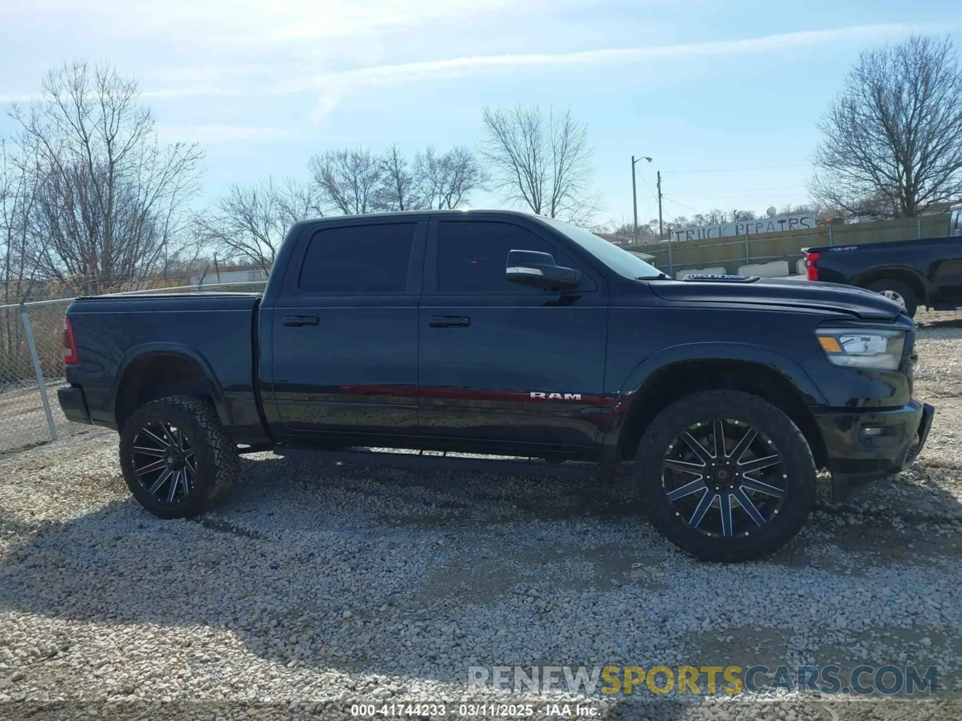 13 Photograph of a damaged car 1C6SRFJT9KN881854 RAM 1500 2019