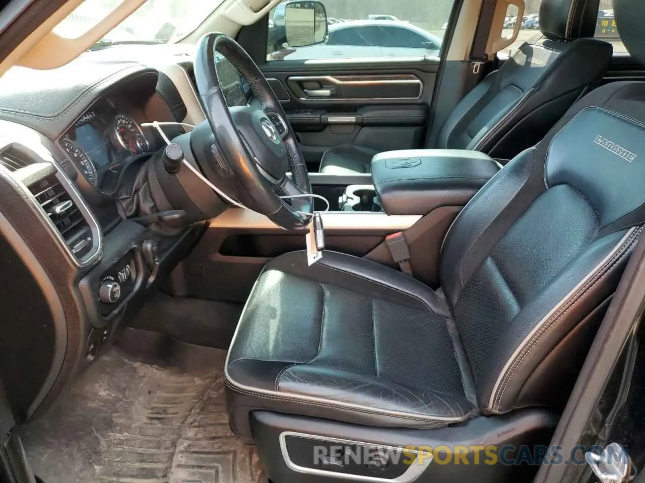 7 Photograph of a damaged car 1C6SRFJTXKN510668 RAM 1500 2019