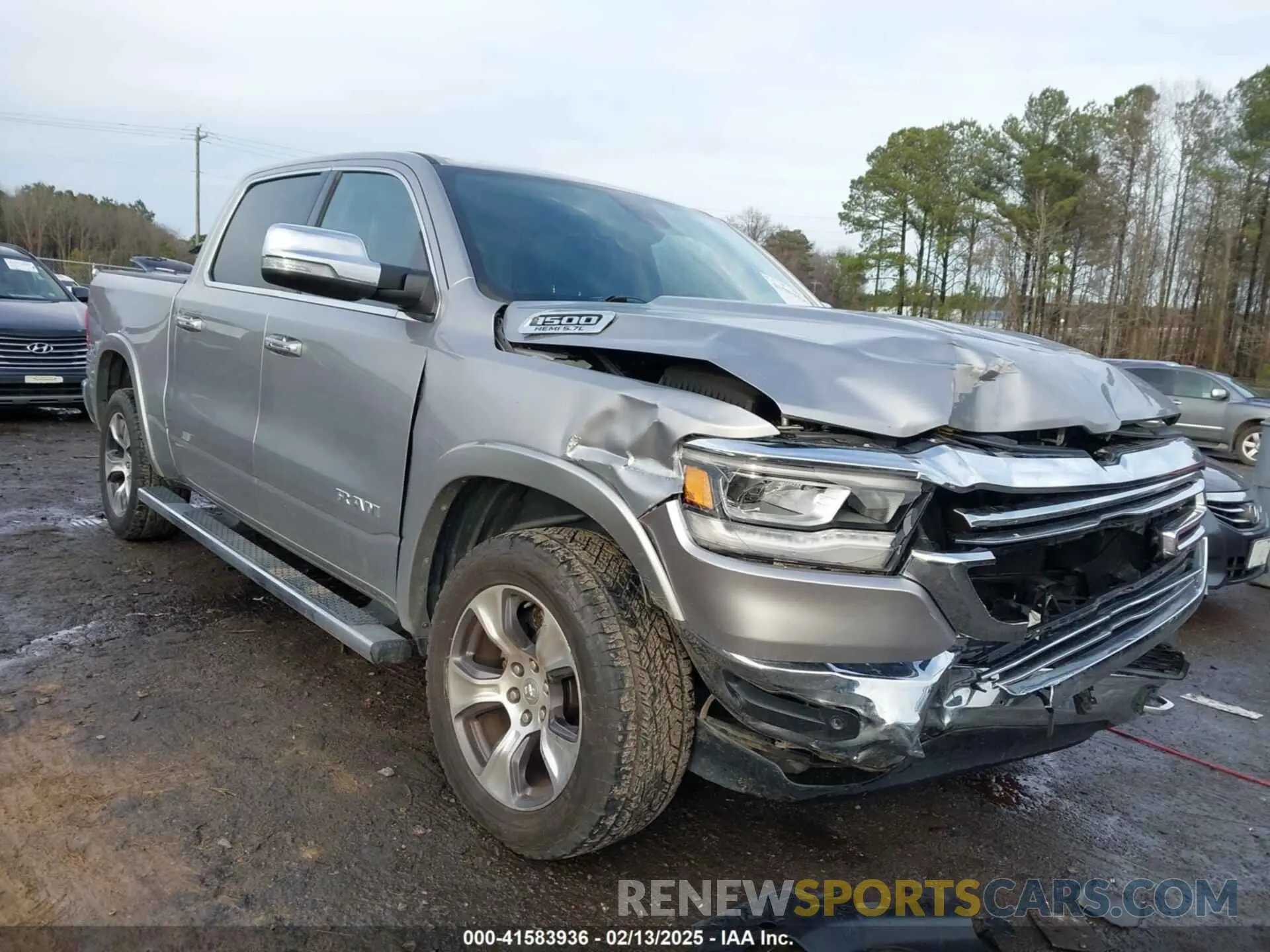 1 Photograph of a damaged car 1C6SRFJTXKN511285 RAM 1500 2019
