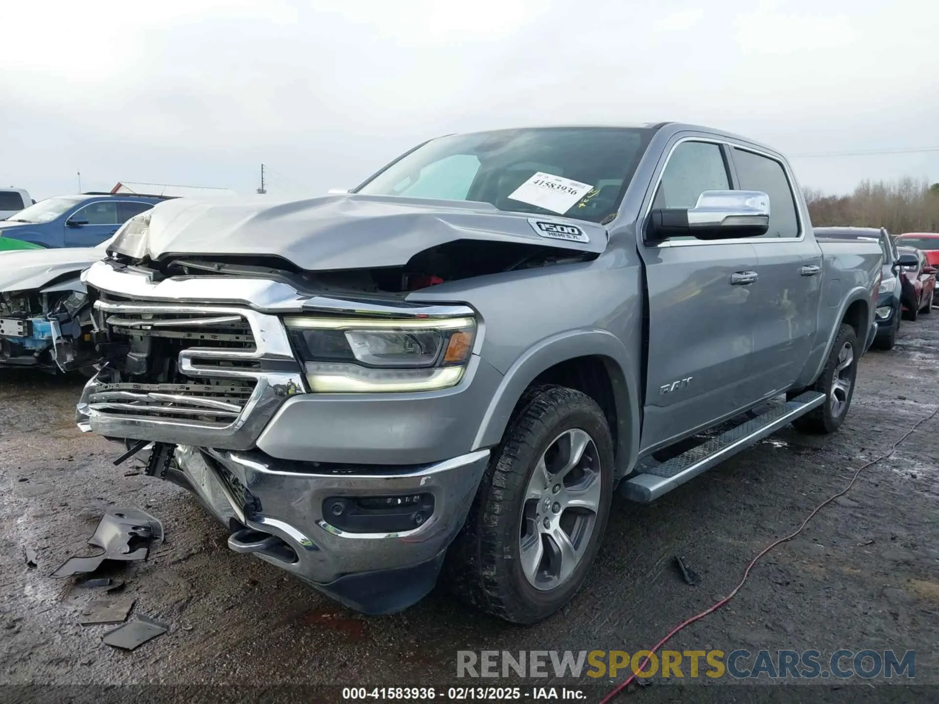 2 Photograph of a damaged car 1C6SRFJTXKN511285 RAM 1500 2019