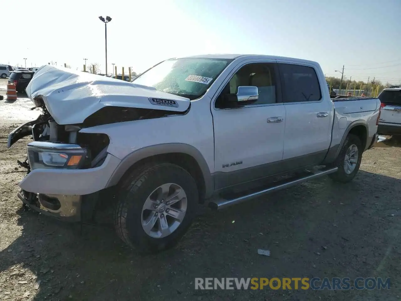 1 Photograph of a damaged car 1C6SRFJTXKN682229 RAM 1500 2019