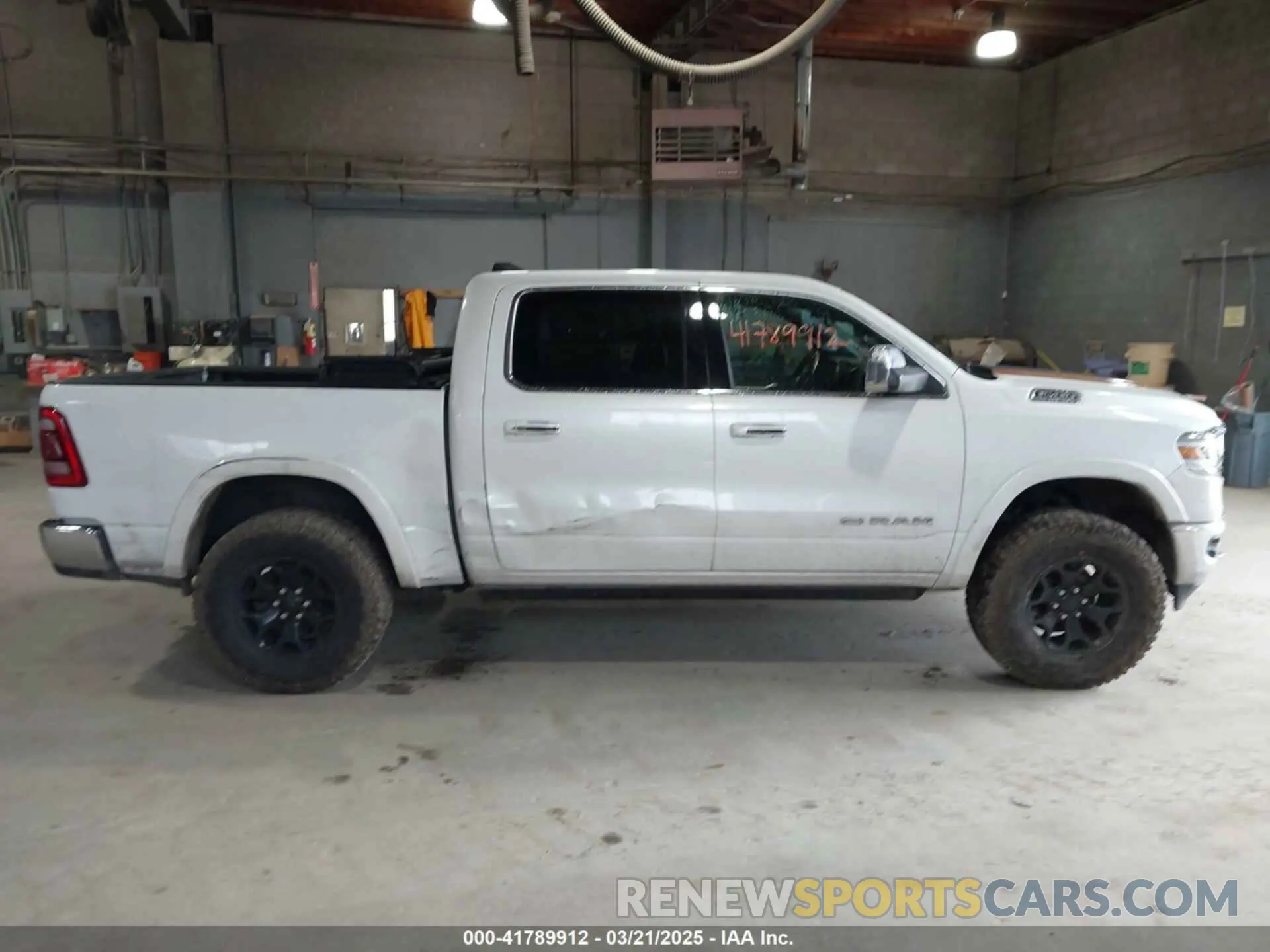 13 Photograph of a damaged car 1C6SRFKT0KN524819 RAM 1500 2019