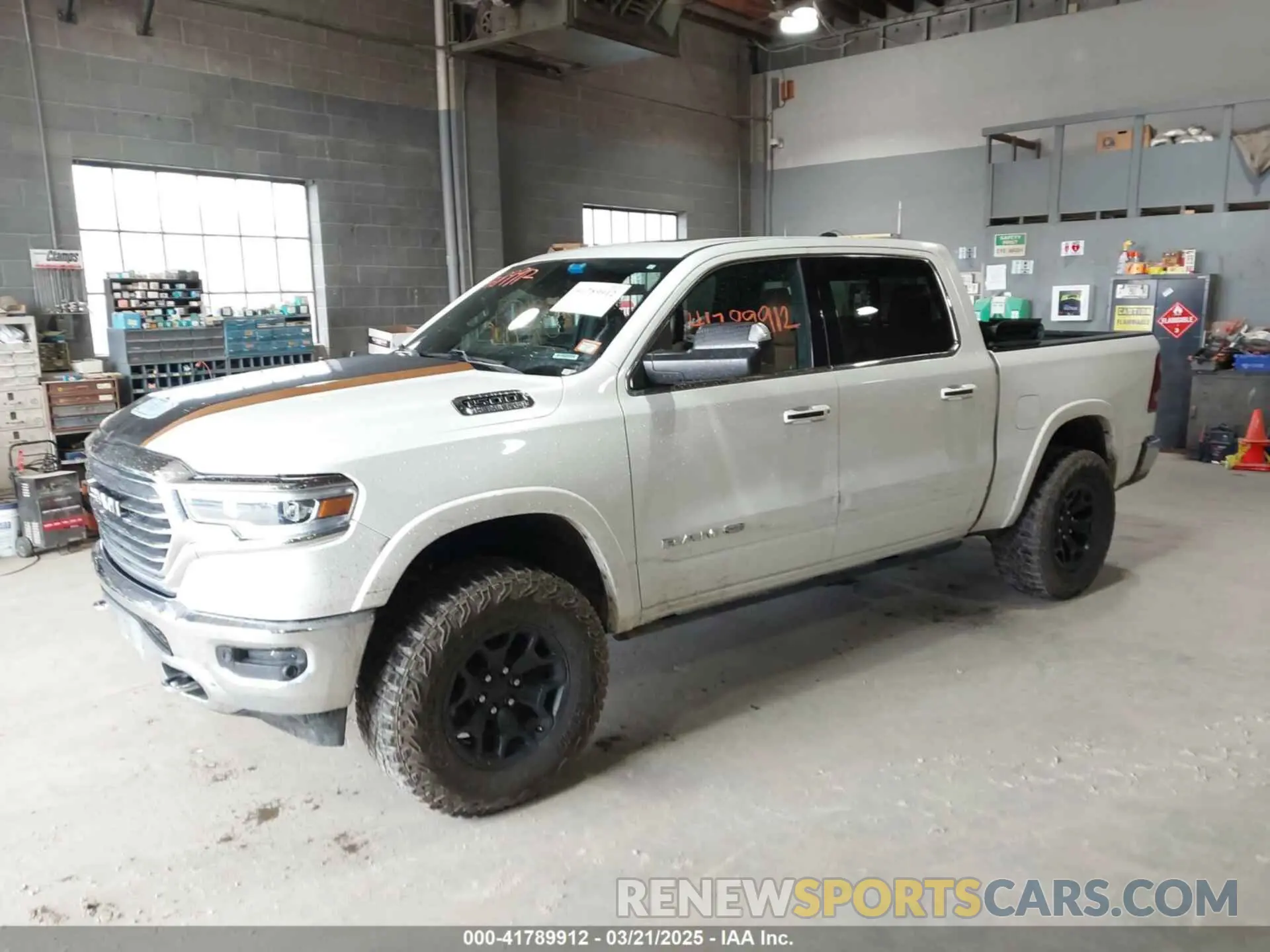 2 Photograph of a damaged car 1C6SRFKT0KN524819 RAM 1500 2019