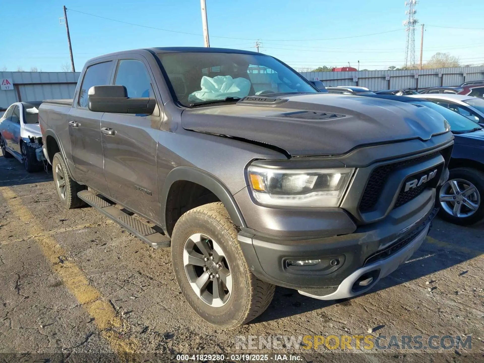 1 Photograph of a damaged car 1C6SRFLT0KN688814 RAM 1500 2019