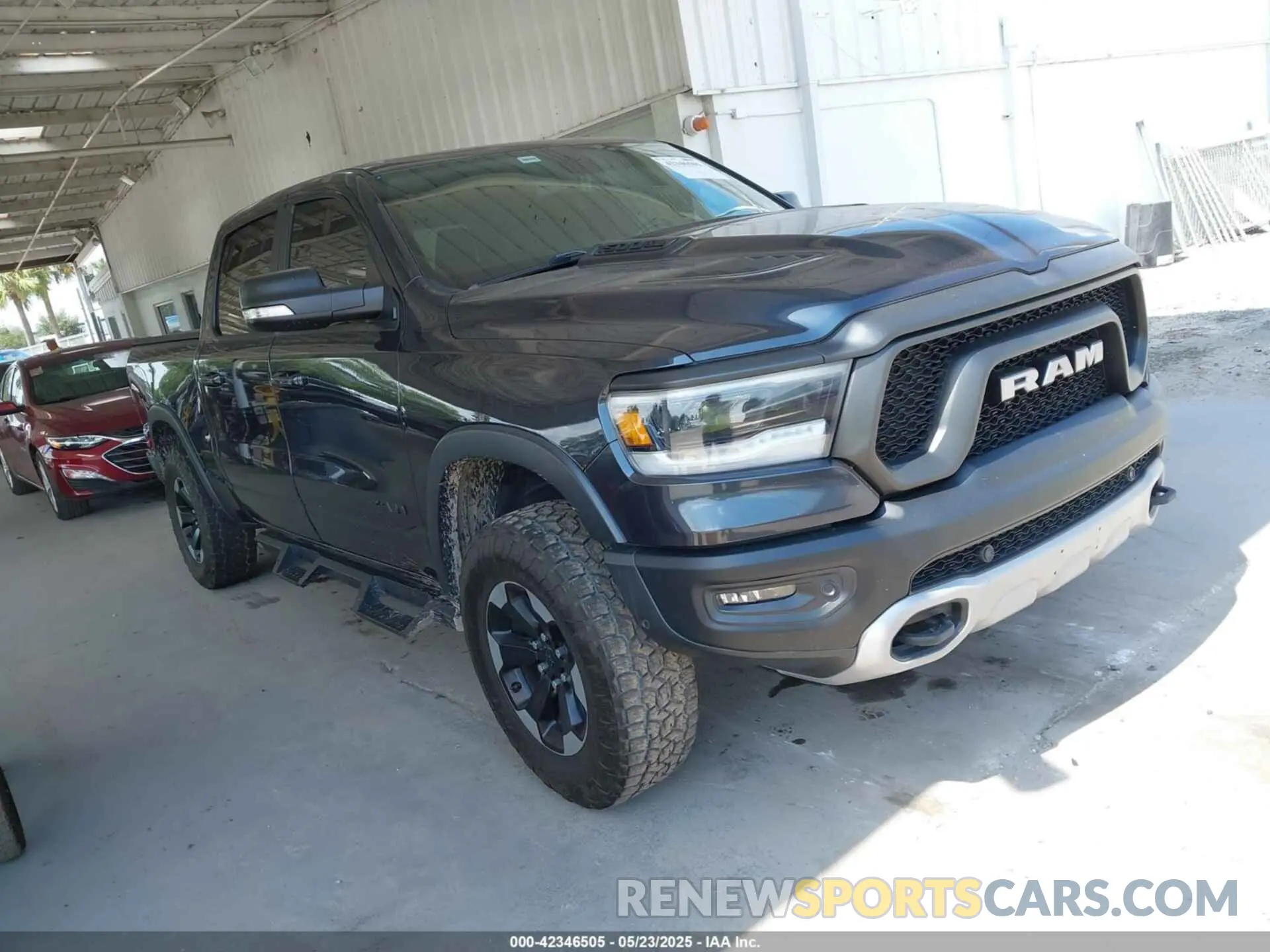 1 Photograph of a damaged car 1C6SRFLT1KN560260 RAM 1500 2019