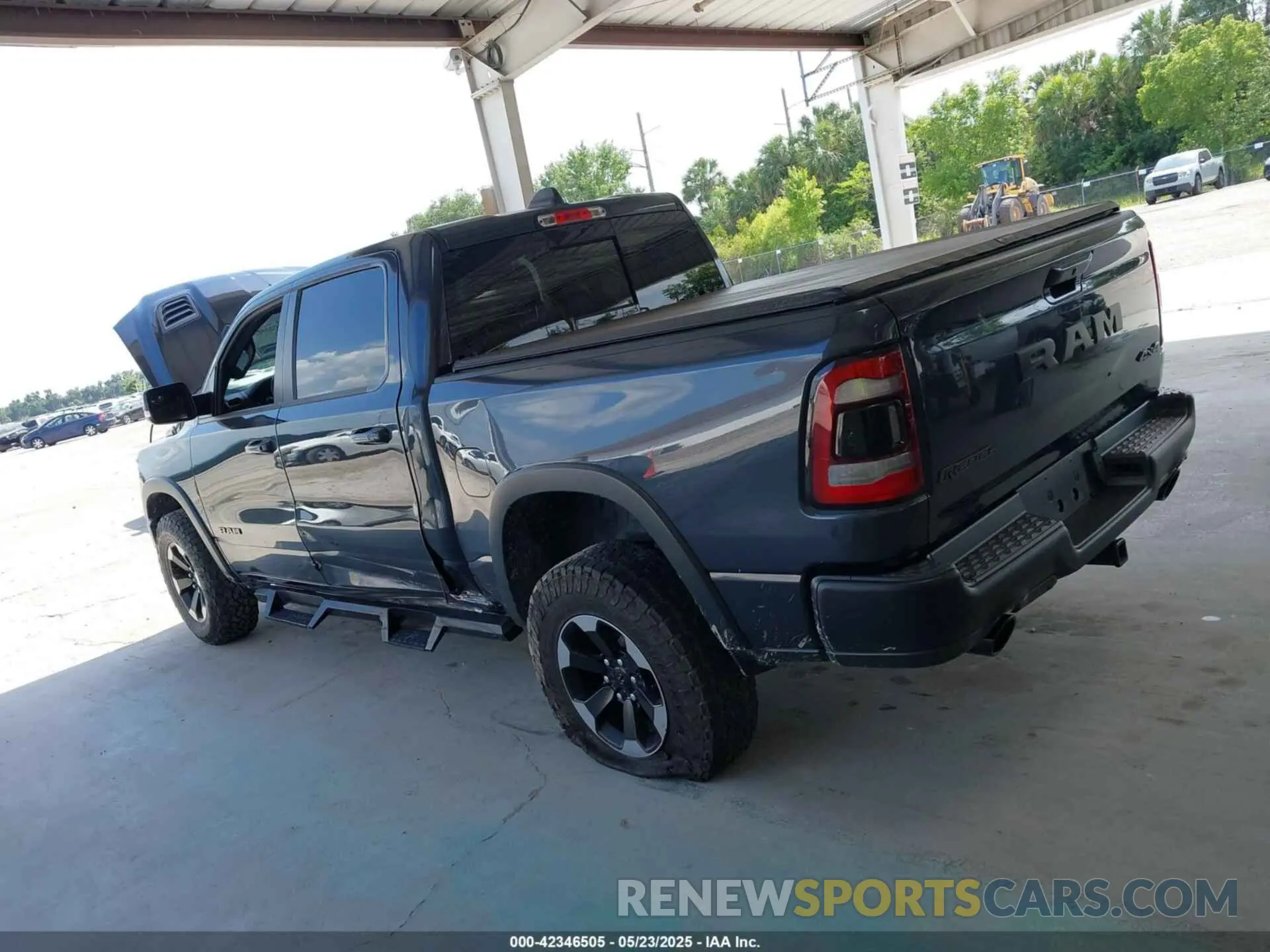 14 Photograph of a damaged car 1C6SRFLT1KN560260 RAM 1500 2019