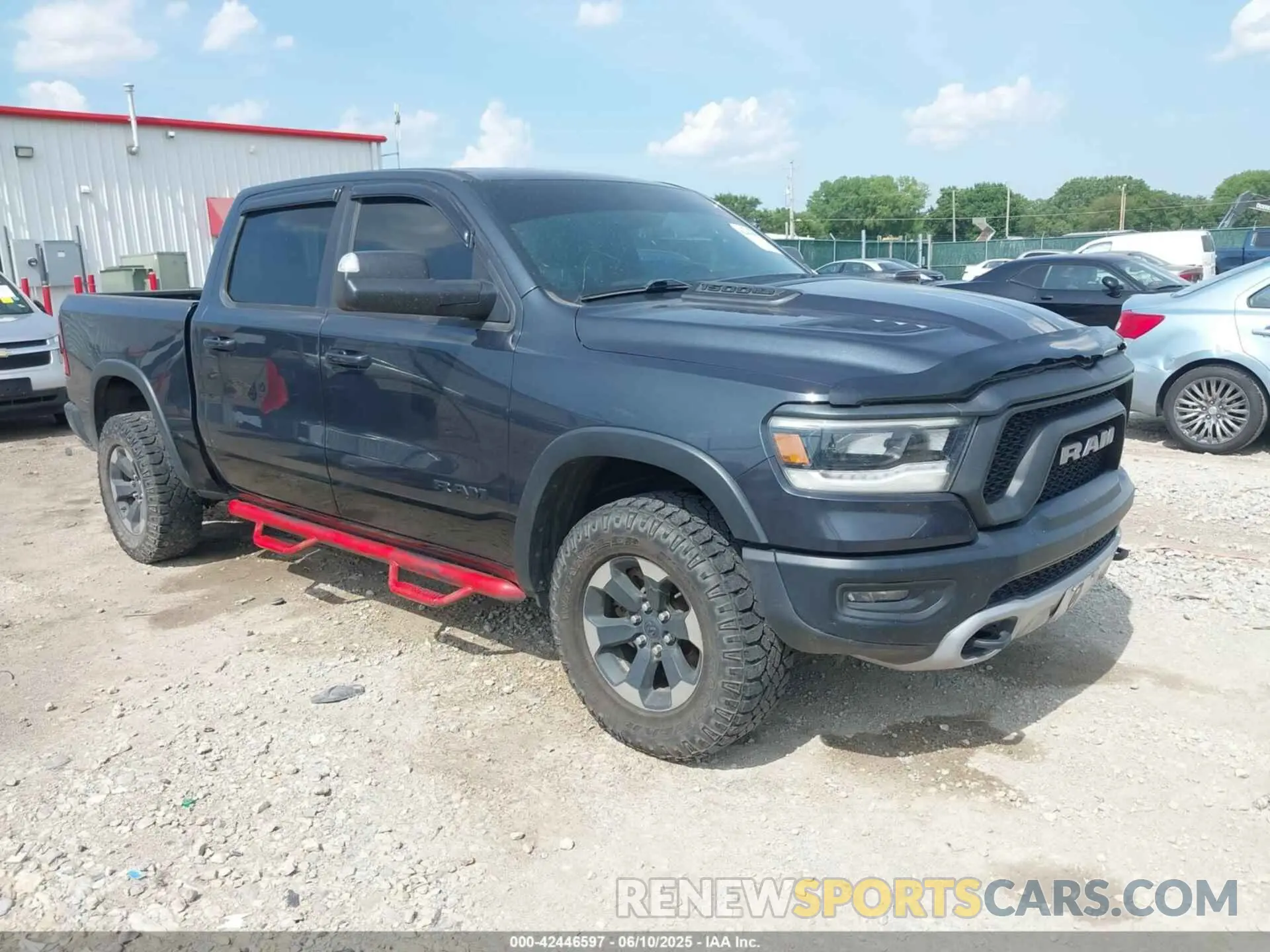 1 Photograph of a damaged car 1C6SRFLT2KN551194 RAM 1500 2019