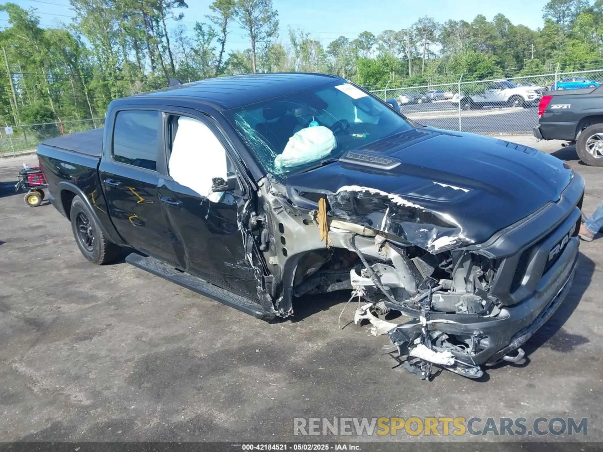 1 Photograph of a damaged car 1C6SRFLT3KN630552 RAM 1500 2019