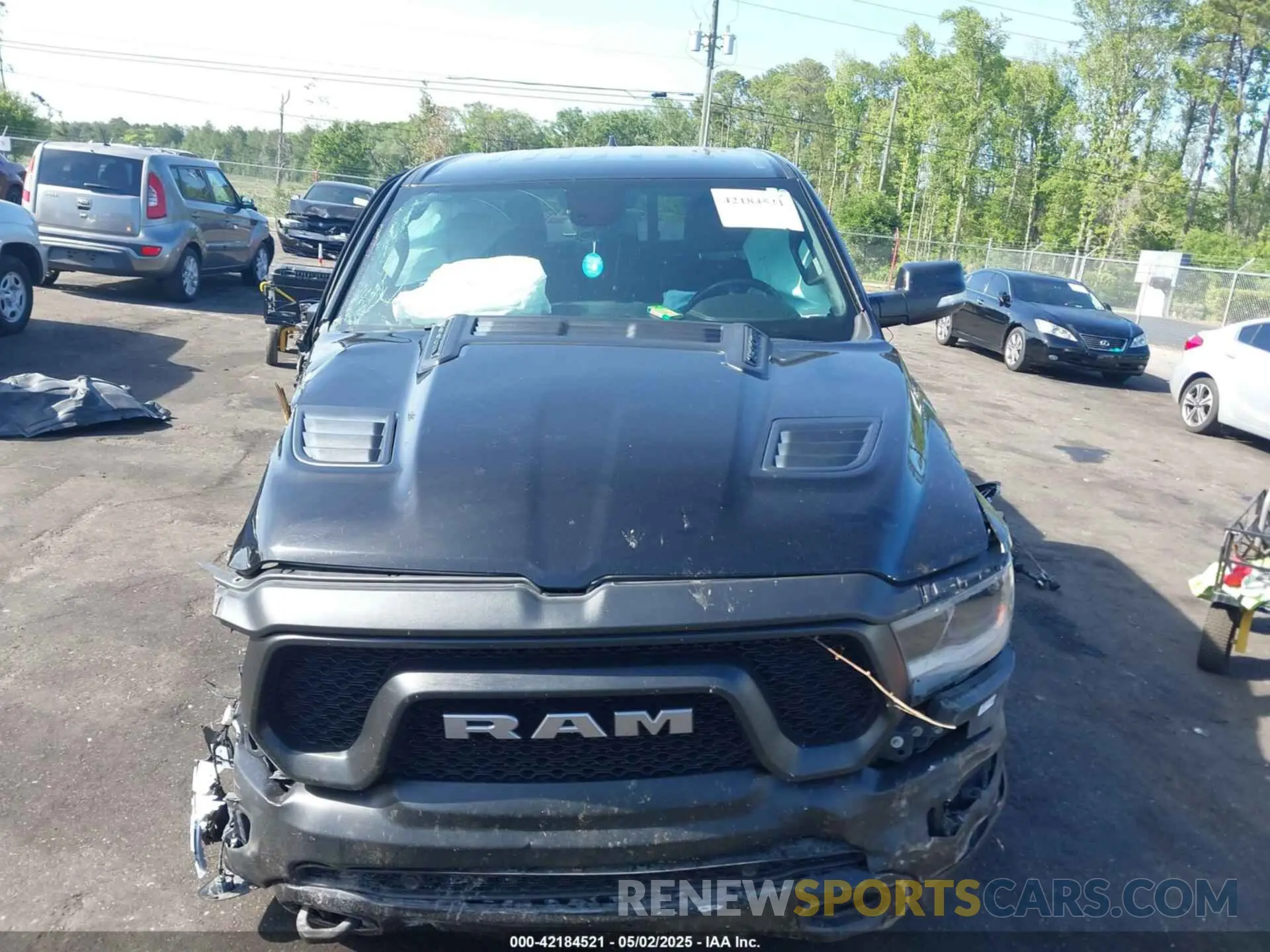 11 Photograph of a damaged car 1C6SRFLT3KN630552 RAM 1500 2019