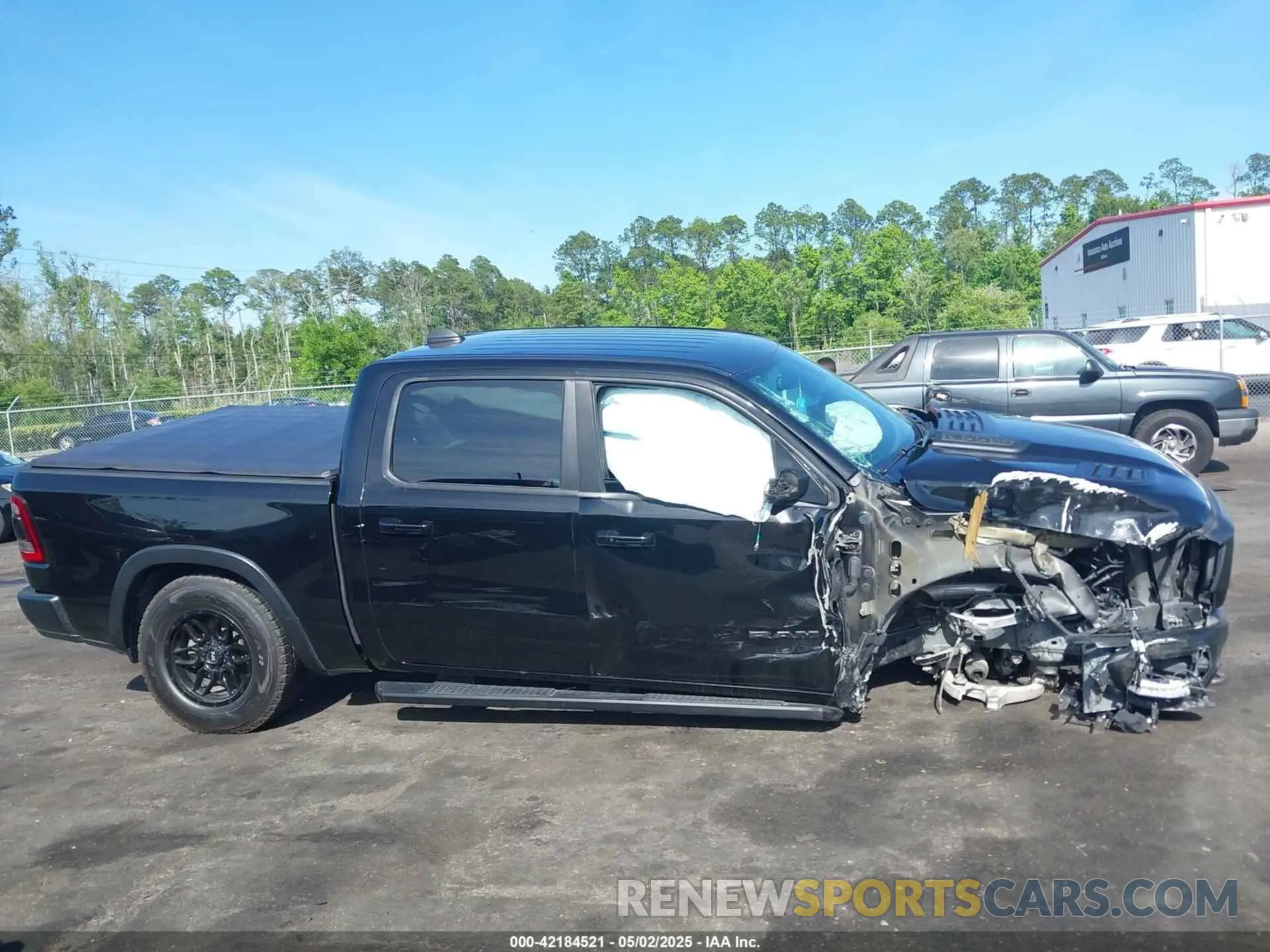 12 Photograph of a damaged car 1C6SRFLT3KN630552 RAM 1500 2019