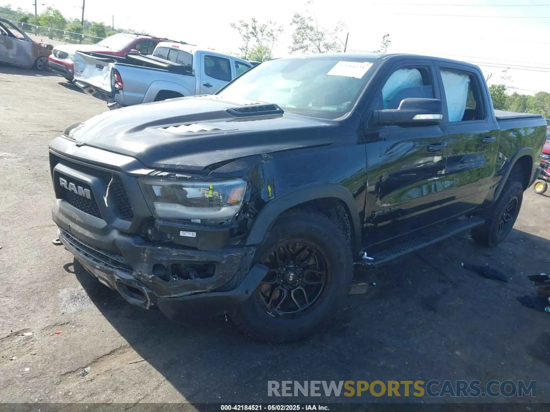 2 Photograph of a damaged car 1C6SRFLT3KN630552 RAM 1500 2019