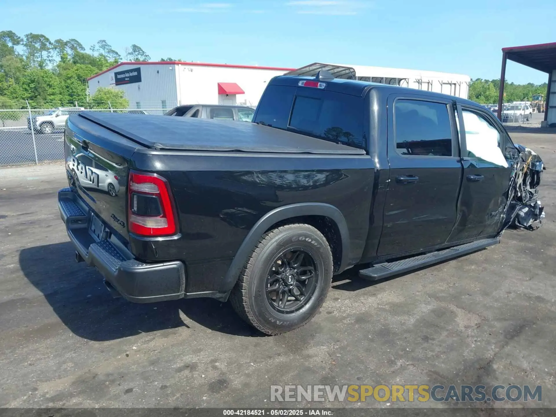 4 Photograph of a damaged car 1C6SRFLT3KN630552 RAM 1500 2019