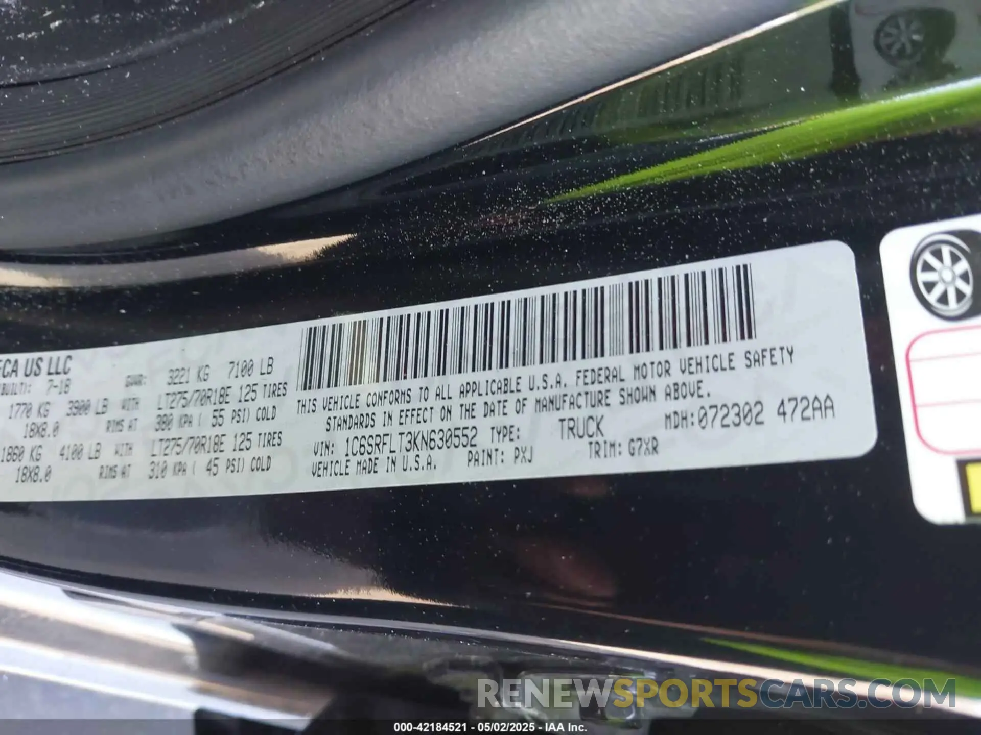 9 Photograph of a damaged car 1C6SRFLT3KN630552 RAM 1500 2019