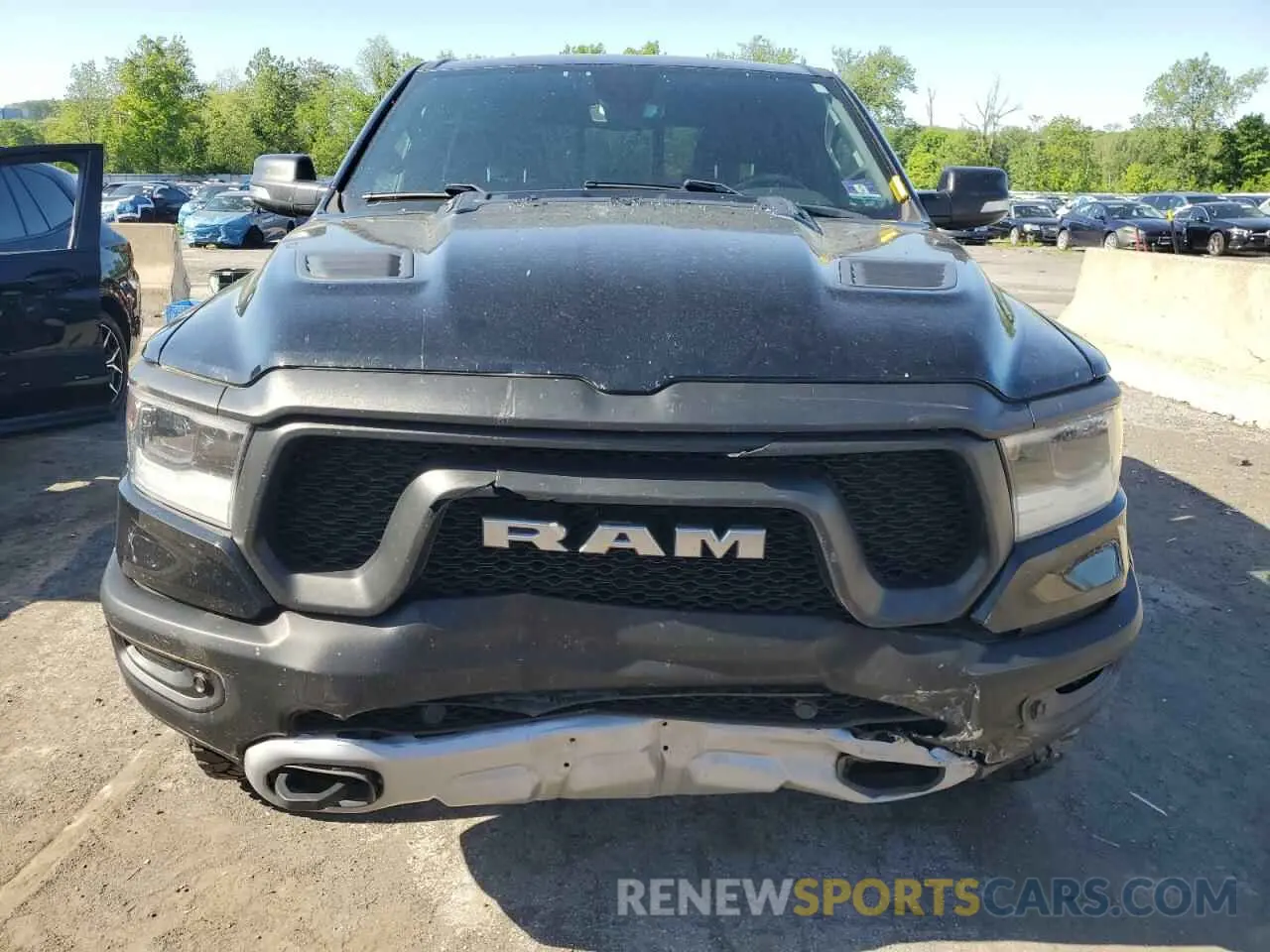 5 Photograph of a damaged car 1C6SRFLT5KN811457 RAM 1500 2019