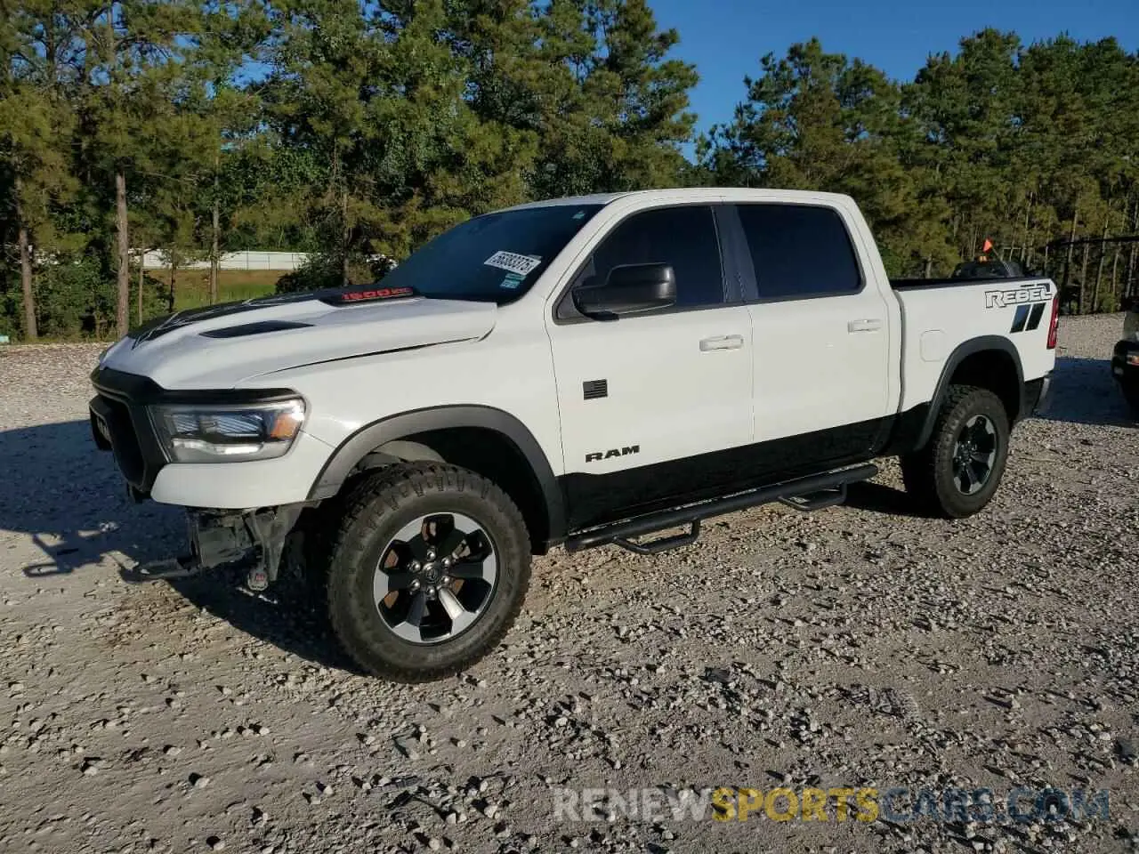 1 Photograph of a damaged car 1C6SRFLT5KN845107 RAM 1500 2019