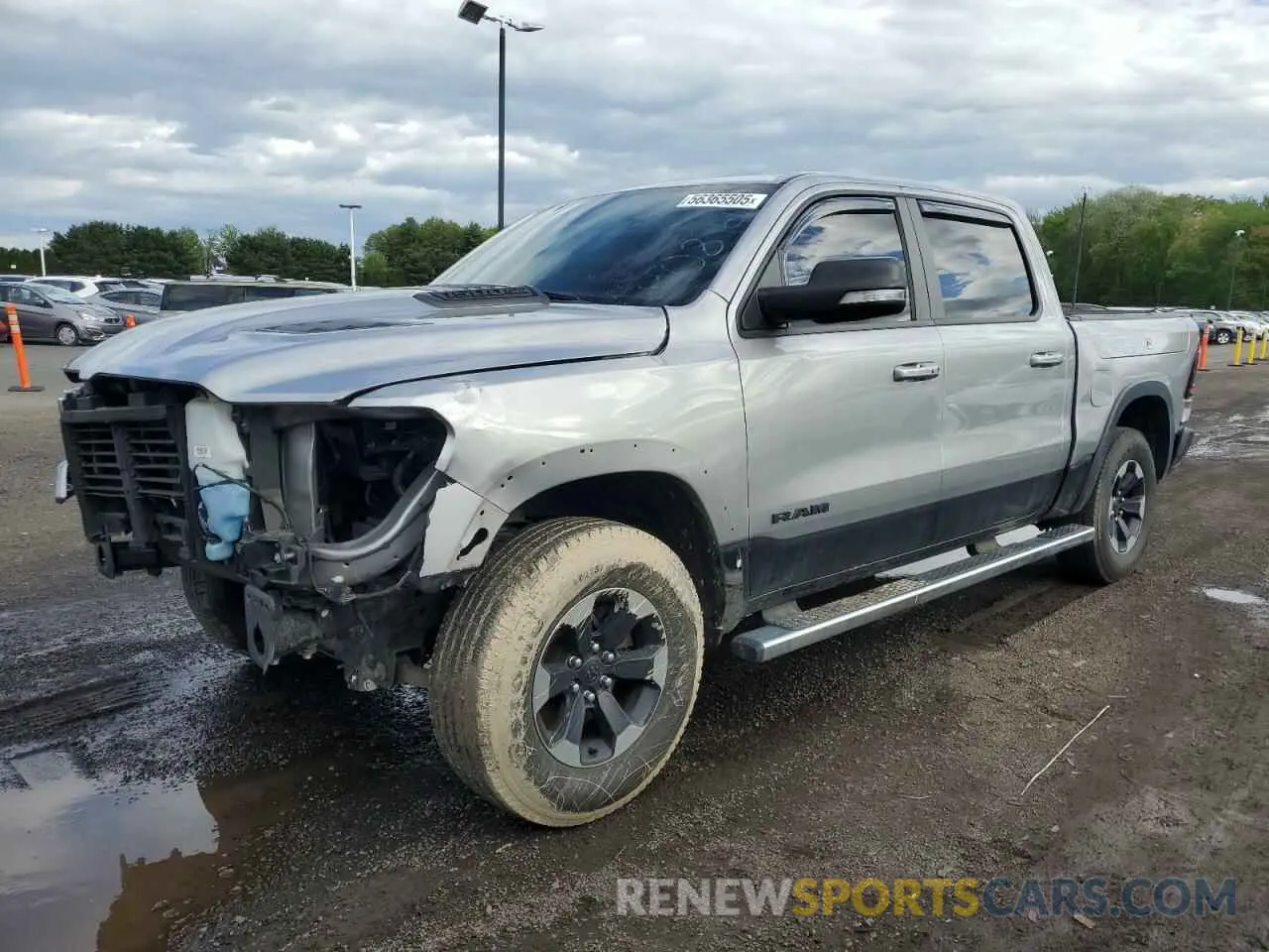 1 Photograph of a damaged car 1C6SRFLT6KN908960 RAM 1500 2019
