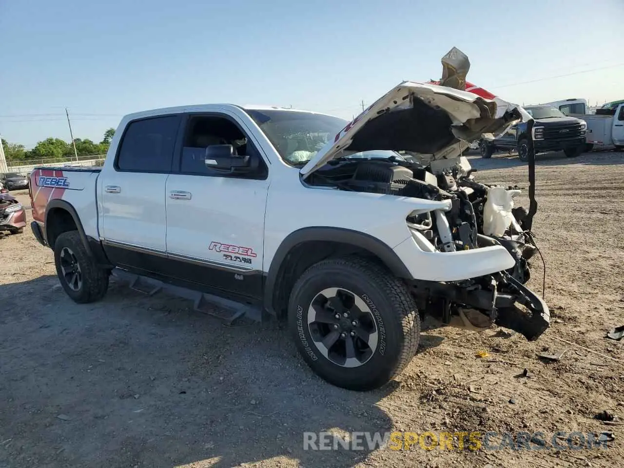 4 Photograph of a damaged car 1C6SRFLT7KN811895 RAM 1500 2019