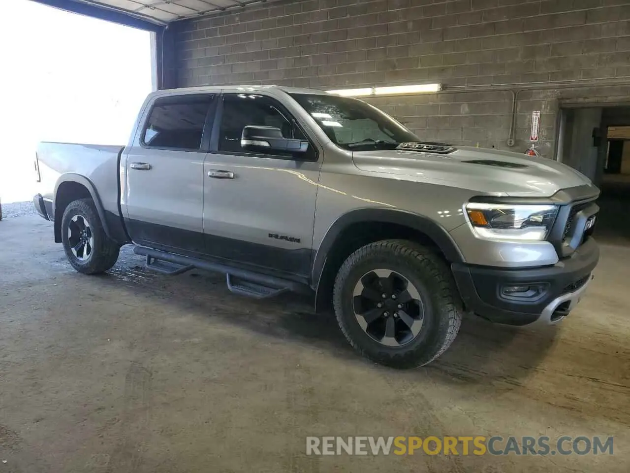 4 Photograph of a damaged car 1C6SRFLT8KN551135 RAM 1500 2019