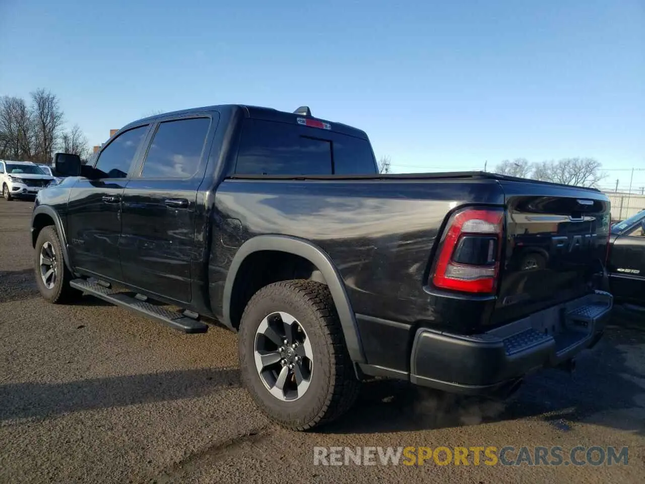 2 Photograph of a damaged car 1C6SRFLT9KN565450 RAM 1500 2019