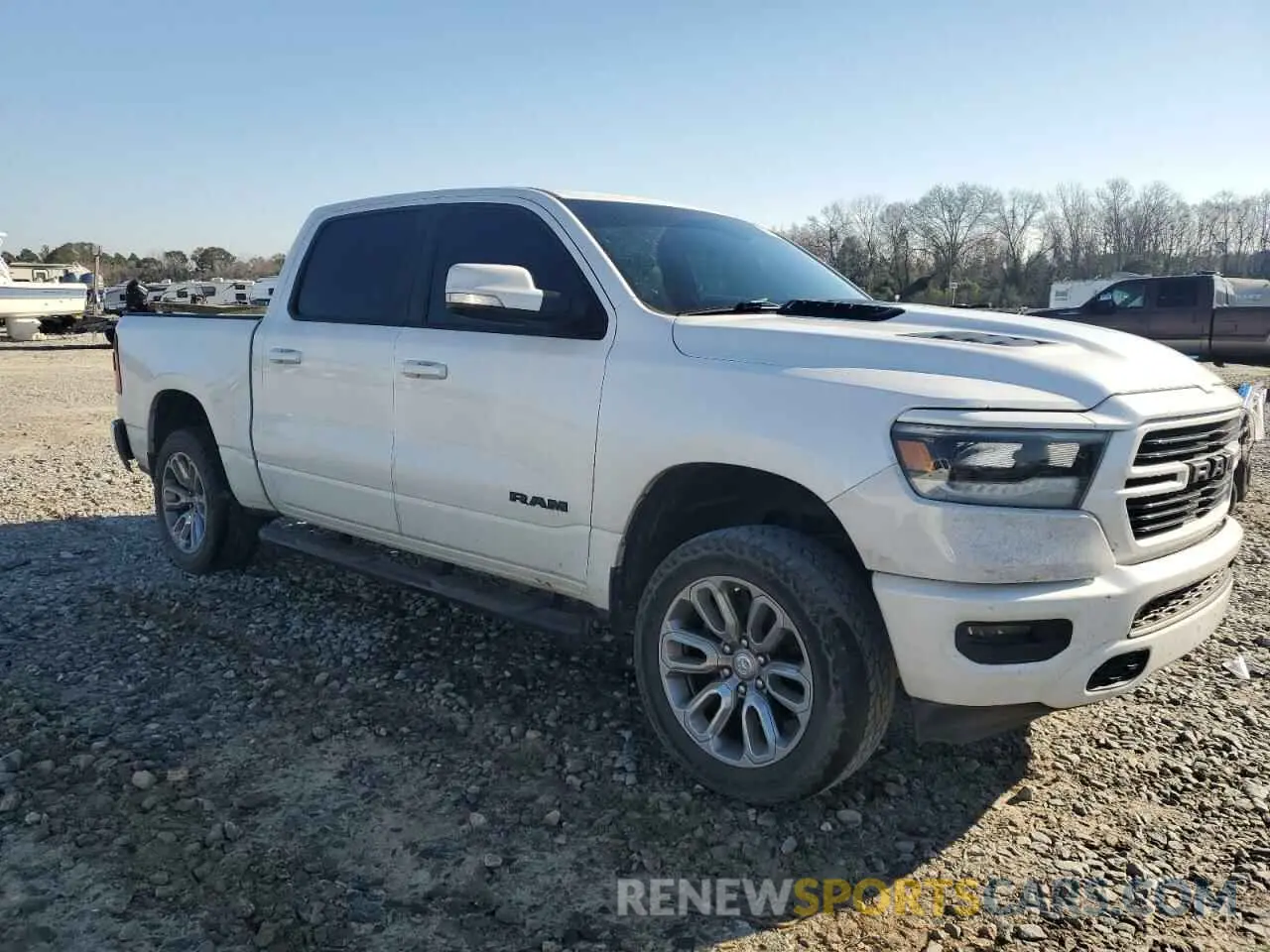 4 Photograph of a damaged car 1C6SRFLT9KN648442 RAM 1500 2019
