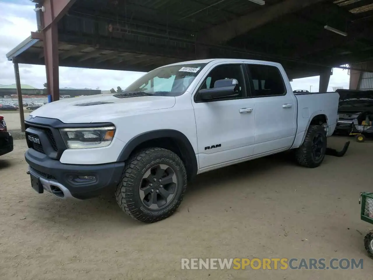 1 Photograph of a damaged car 1C6SRFLTXKN618849 RAM 1500 2019
